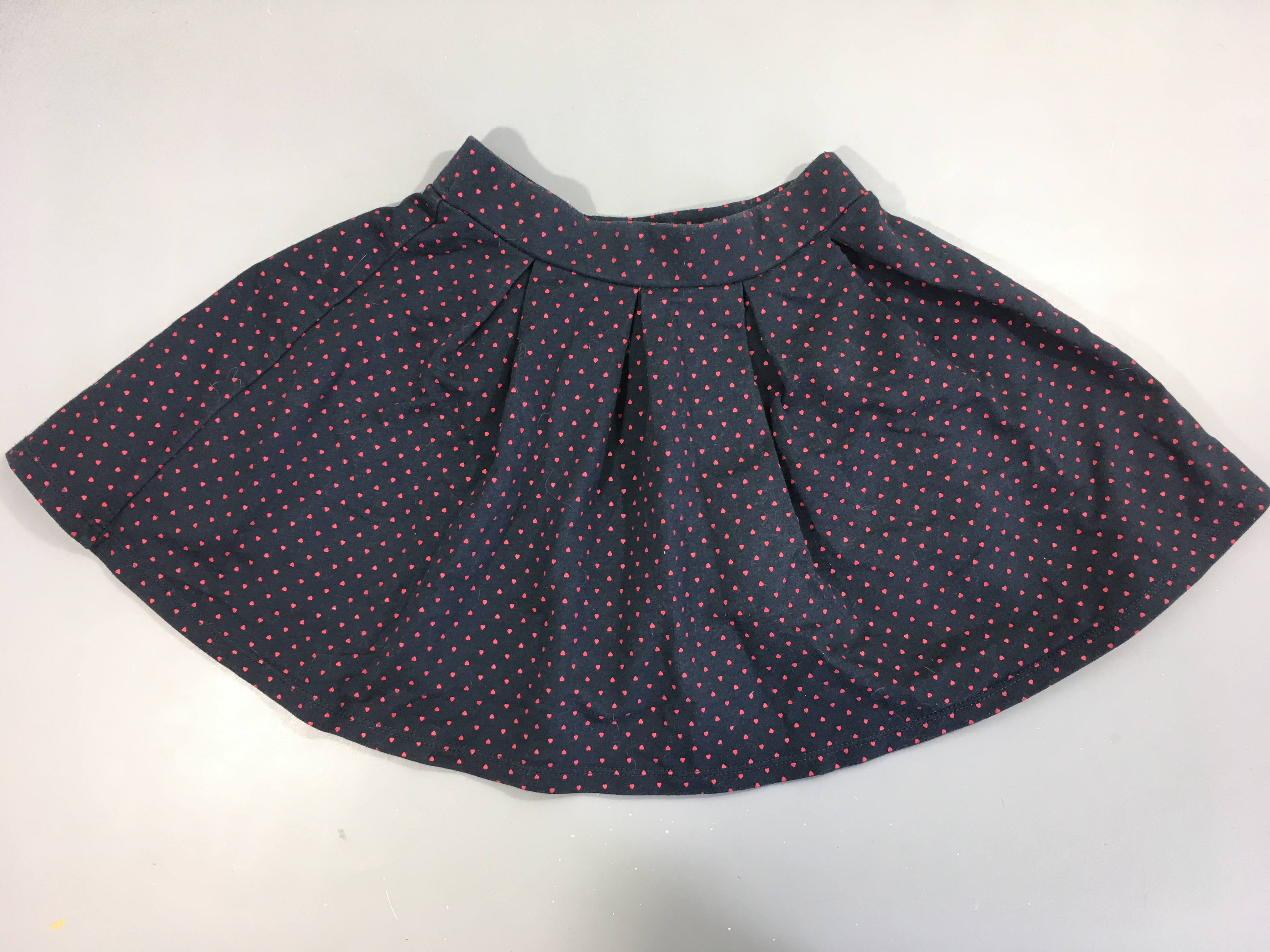 Jupe molleton bleu marine pois roses, boulochée