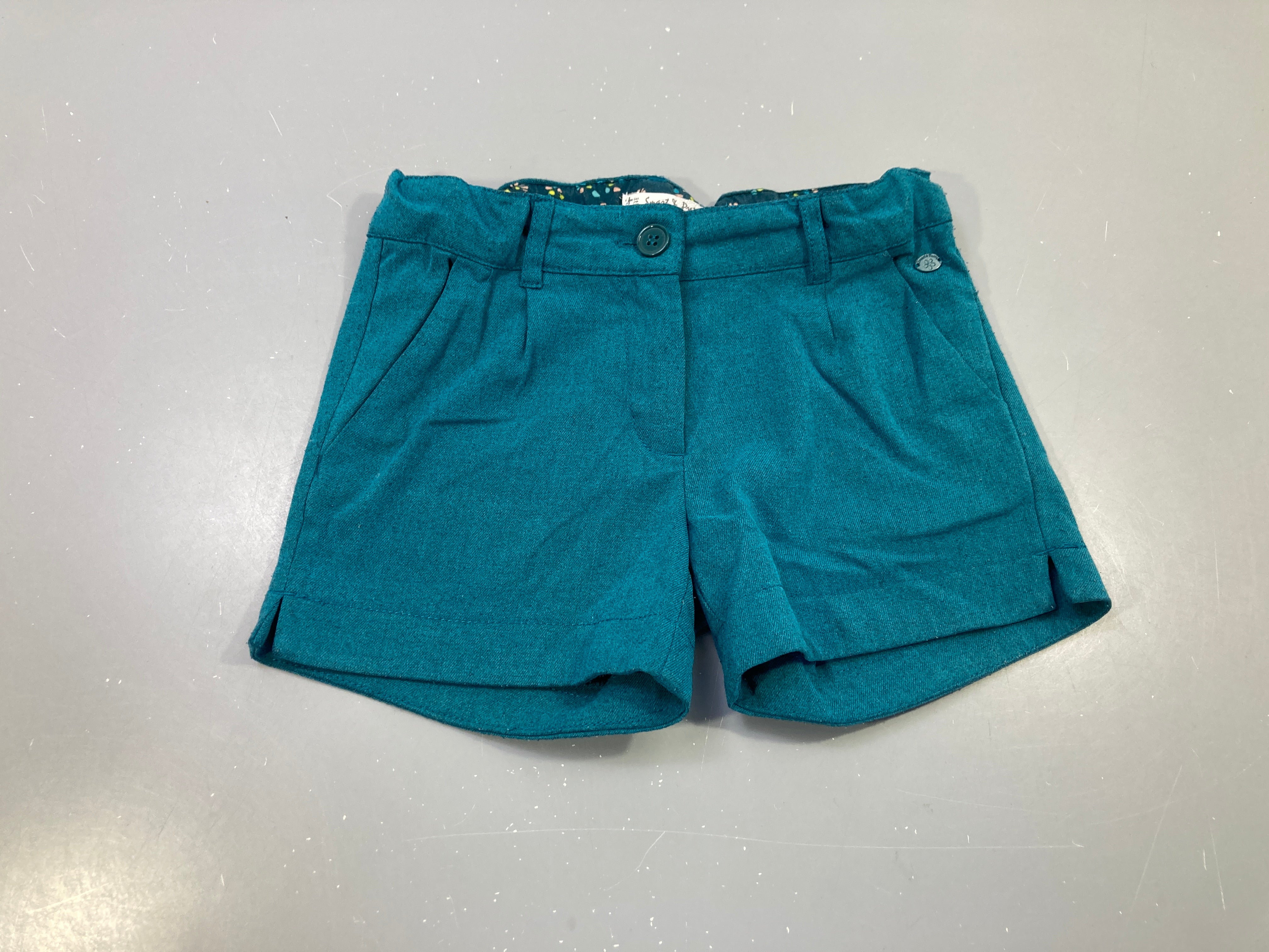 Short à revers vert bleuté chiné