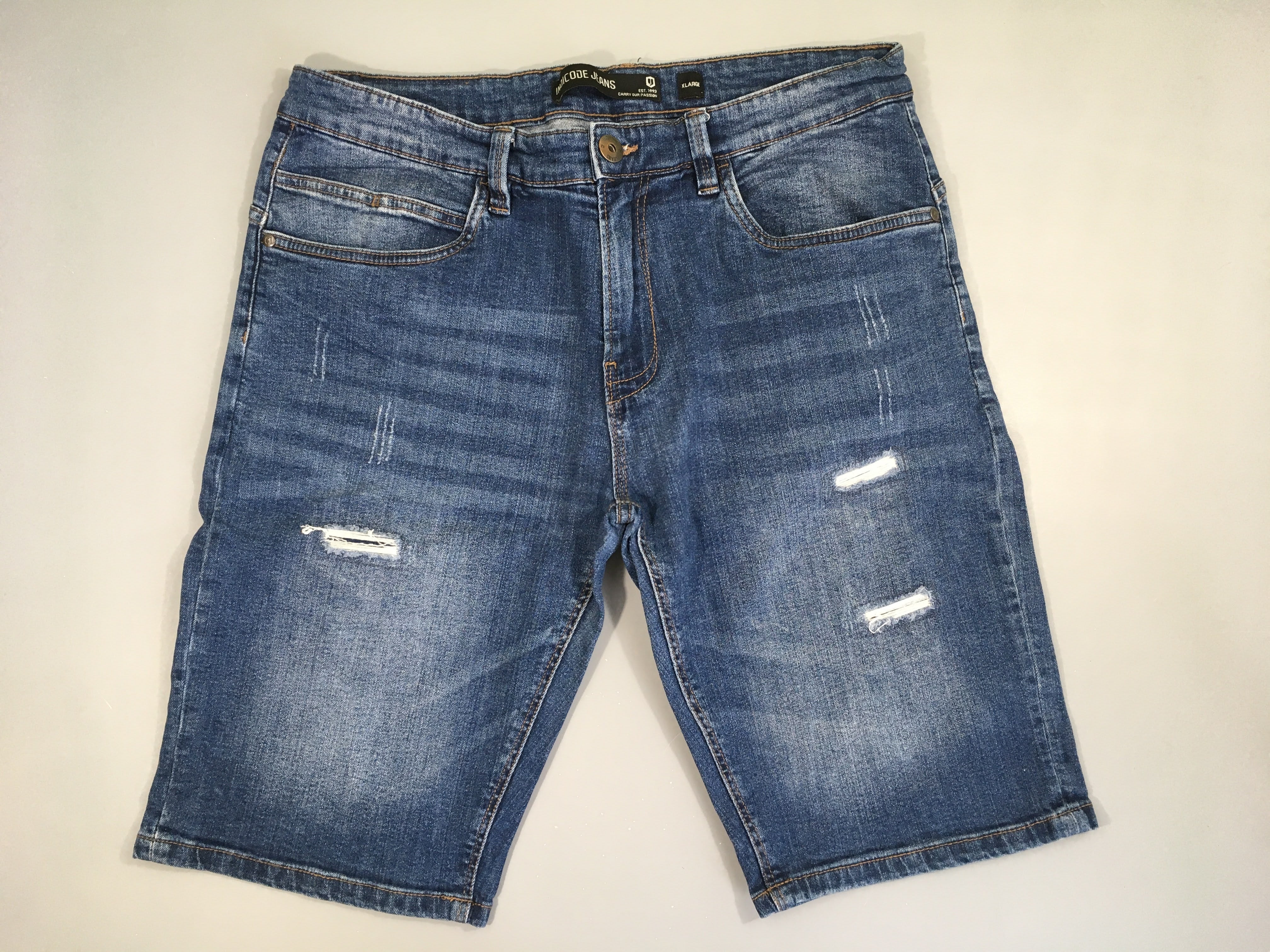 Bermuda en jean effet éraillé