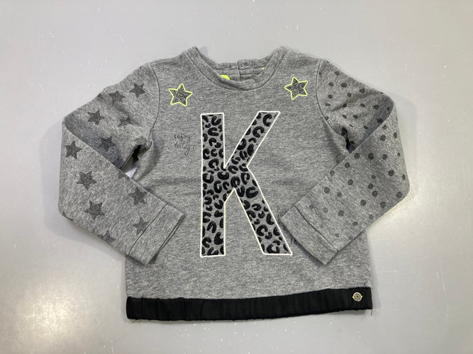Sweat gris chiné pailleté K léopard, étoiles et pois, bas noir Légèrement bouloché, moins cher chez Petit Kiwi