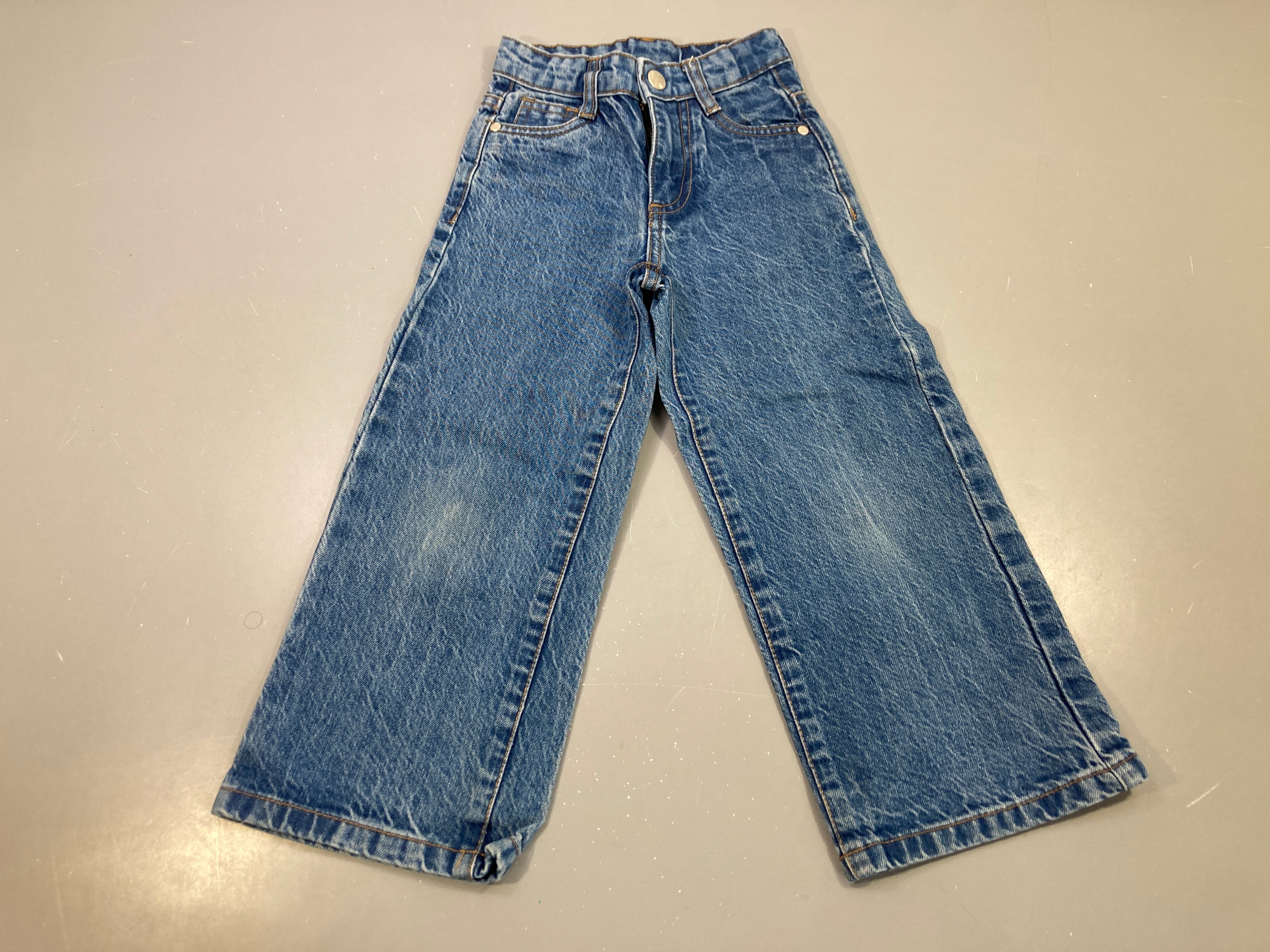 Pantalon bleu jean large délavé, taille réglable