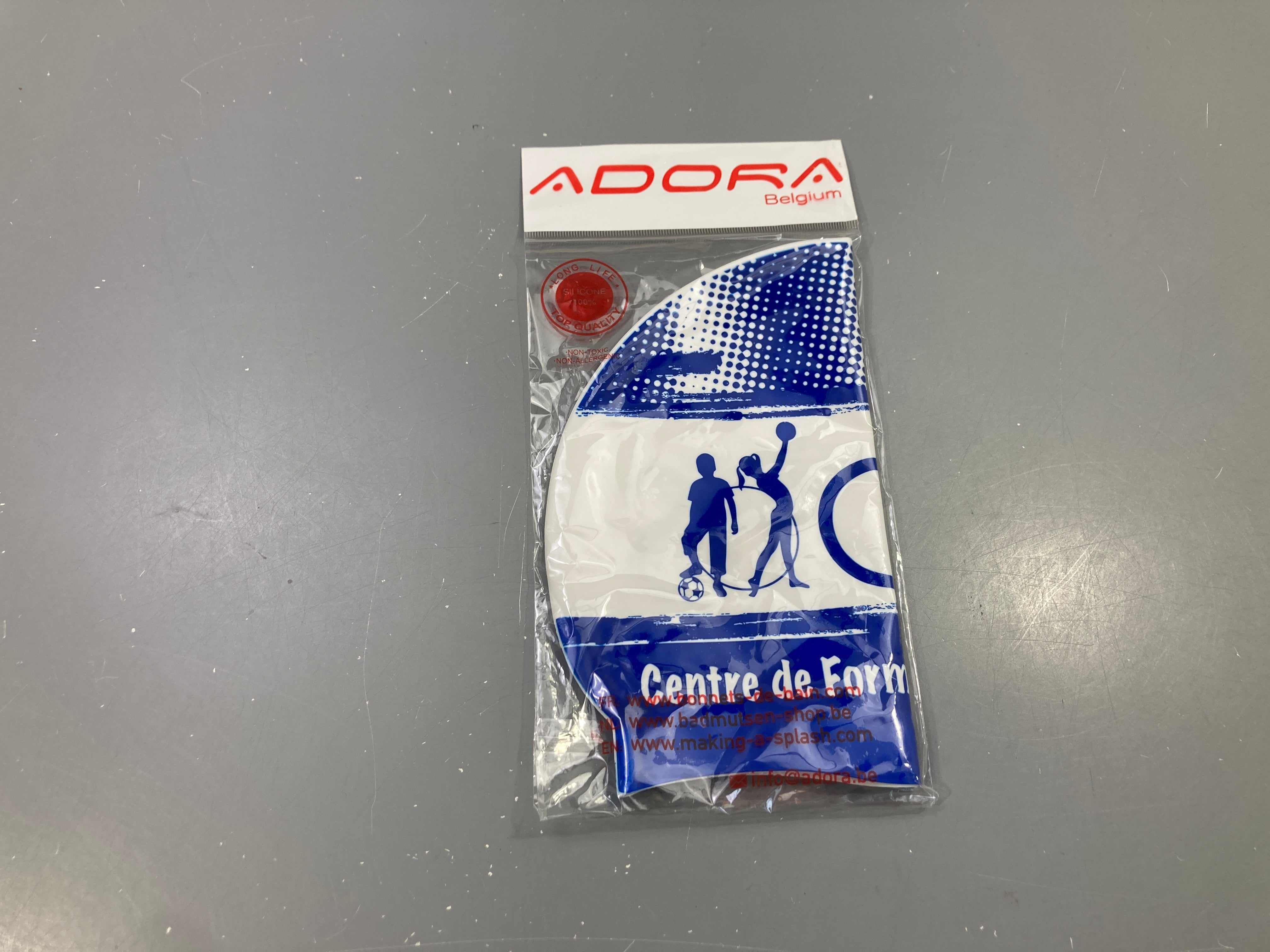 Bonnet de bain silicone blanc et bleu, neuf sous emballage, Adora