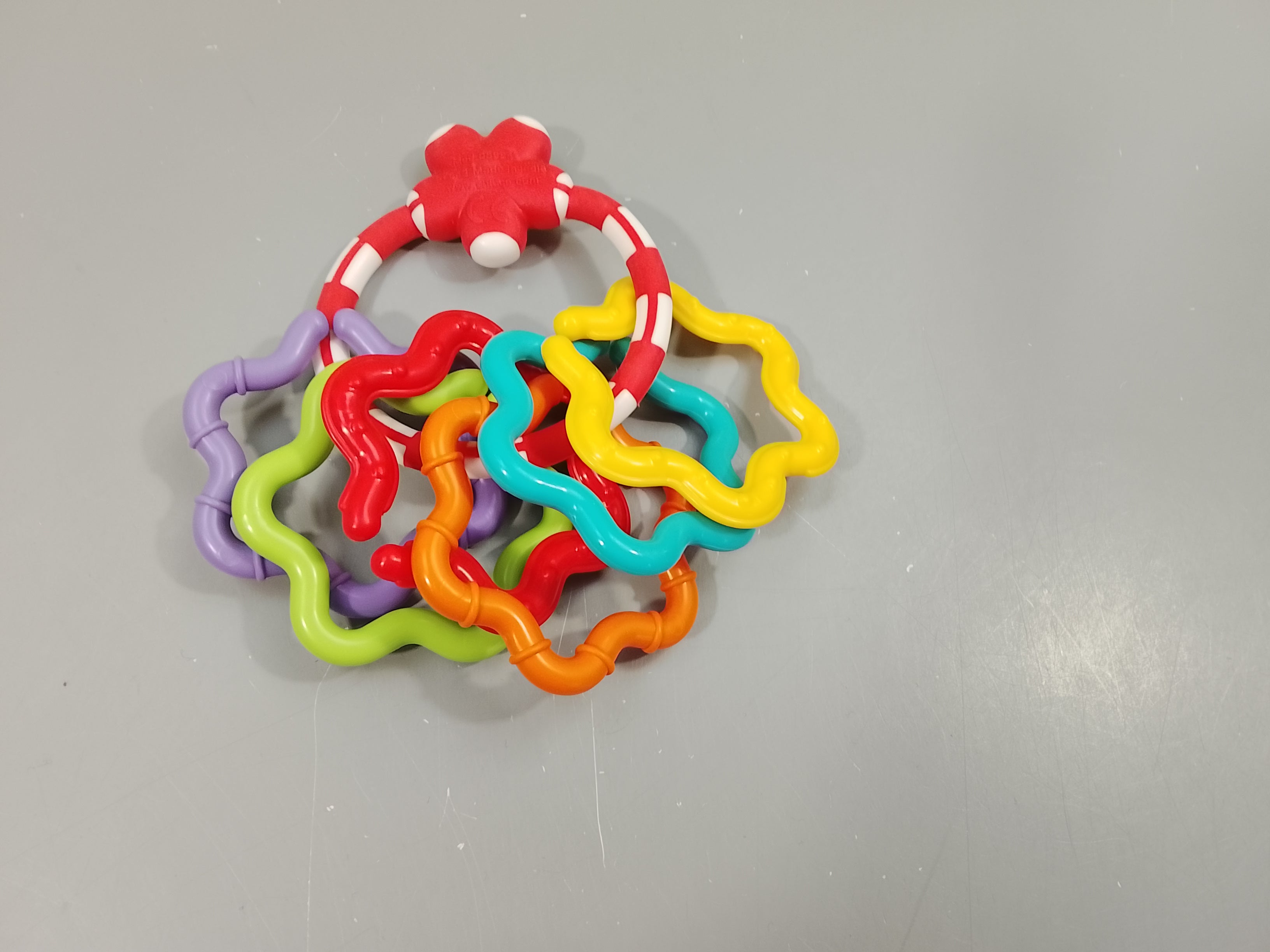 Hochet anneaux  colorés