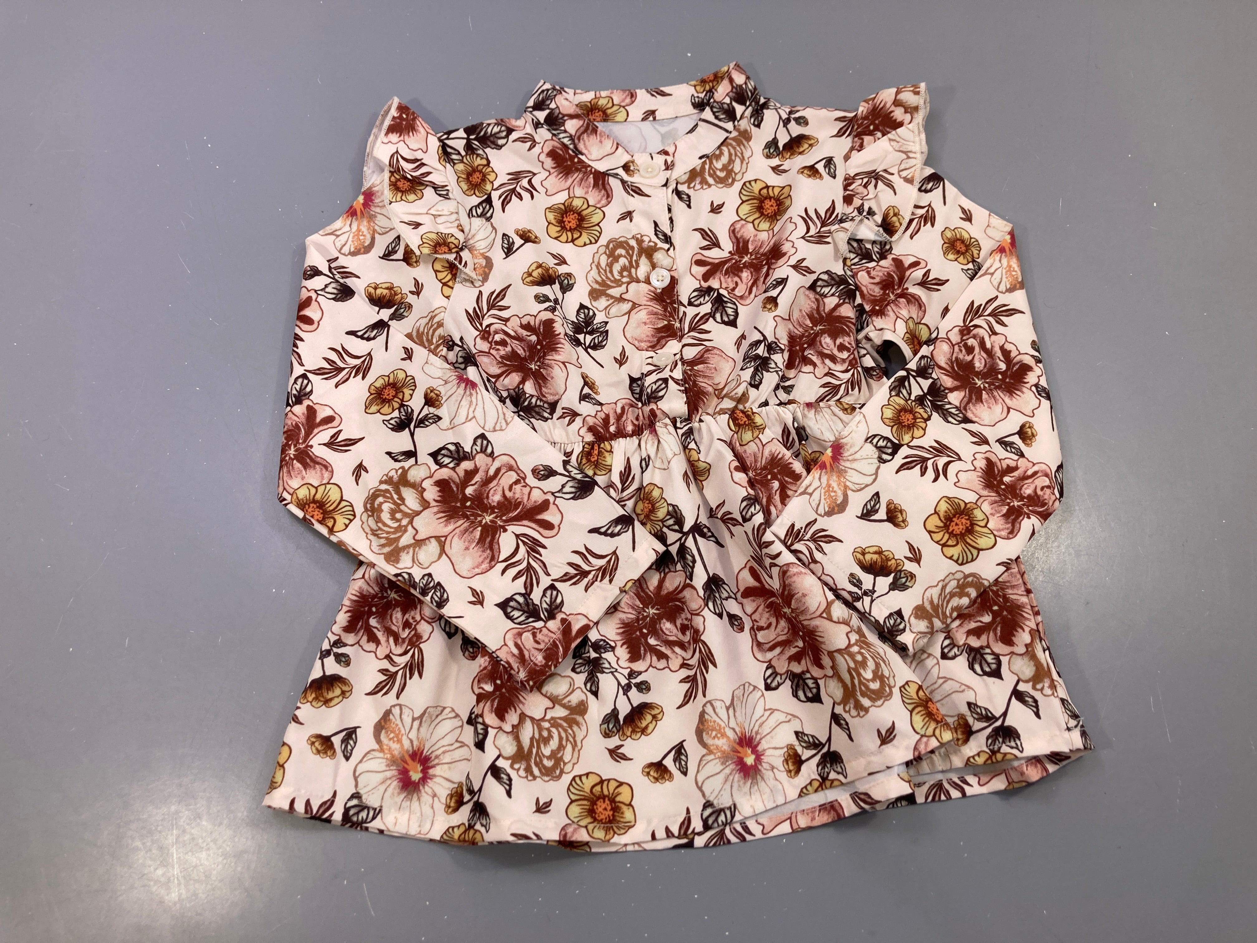 Blouse m.l écru fleurs bordeaux moutarde, volants épaules, boutonnée
