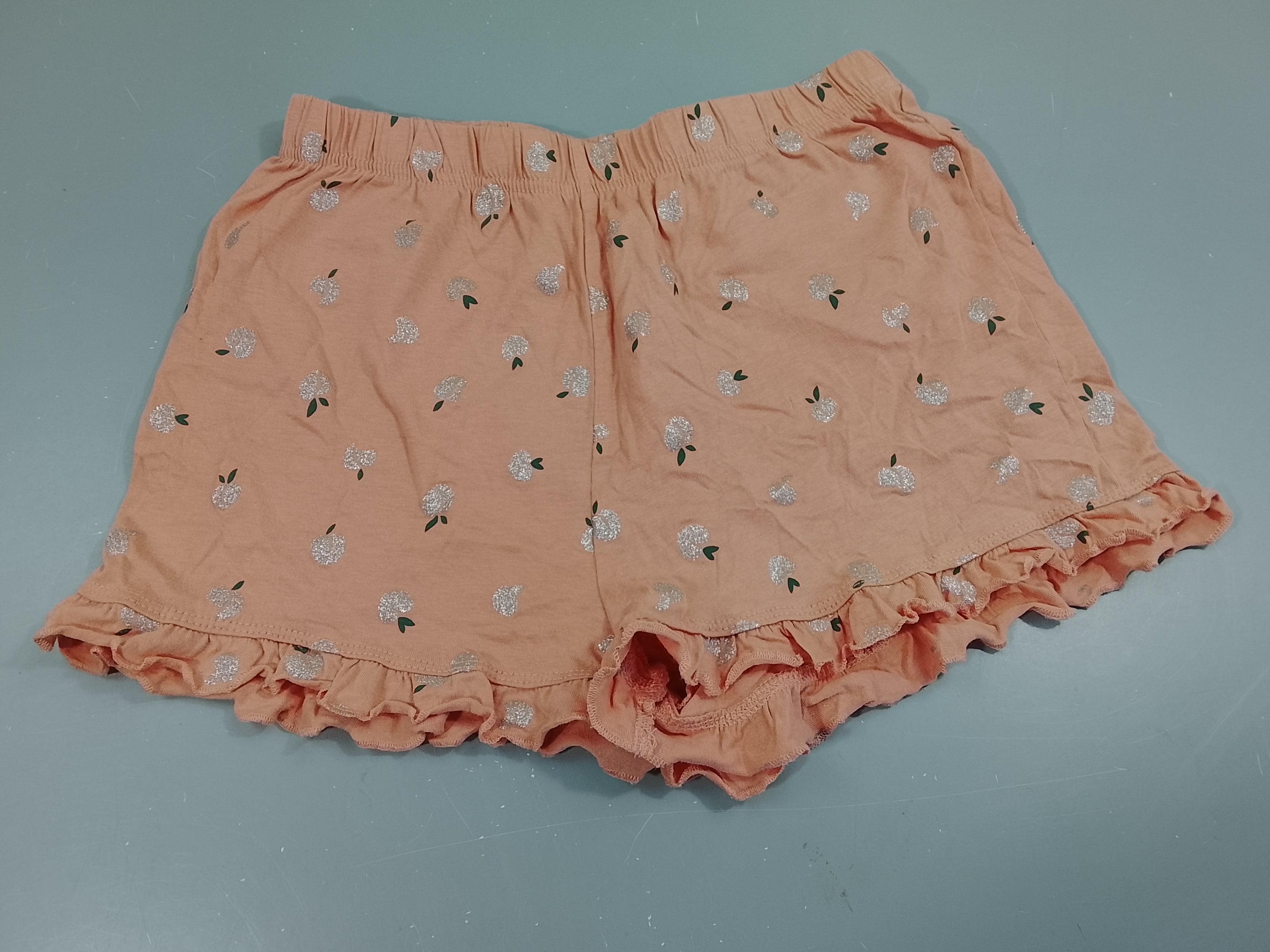 Short jersey saumon, pommes pailletées , dessous ondulé