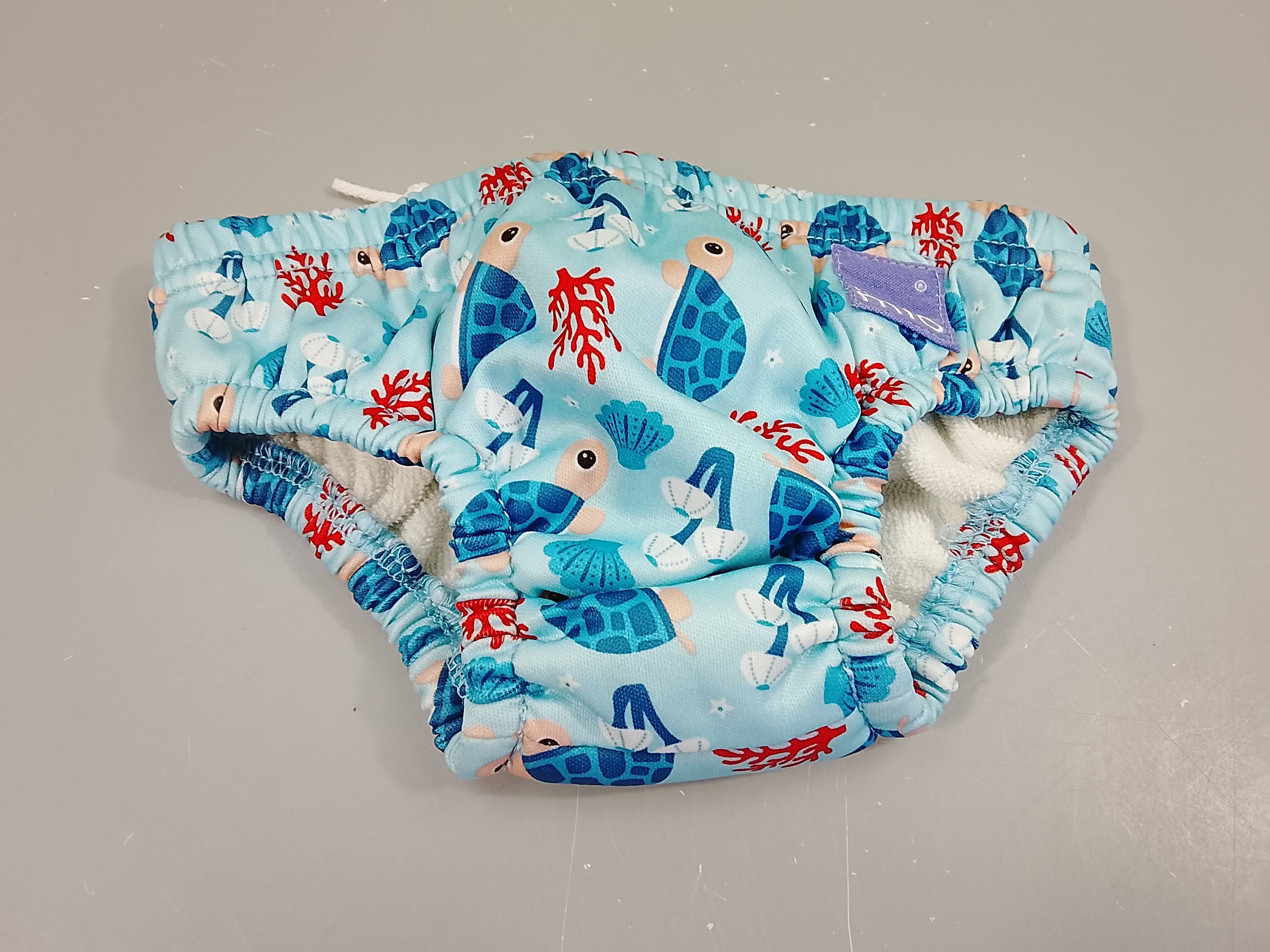 Culotte maillot bleu  tortues  Bambino Mio  5-7kg