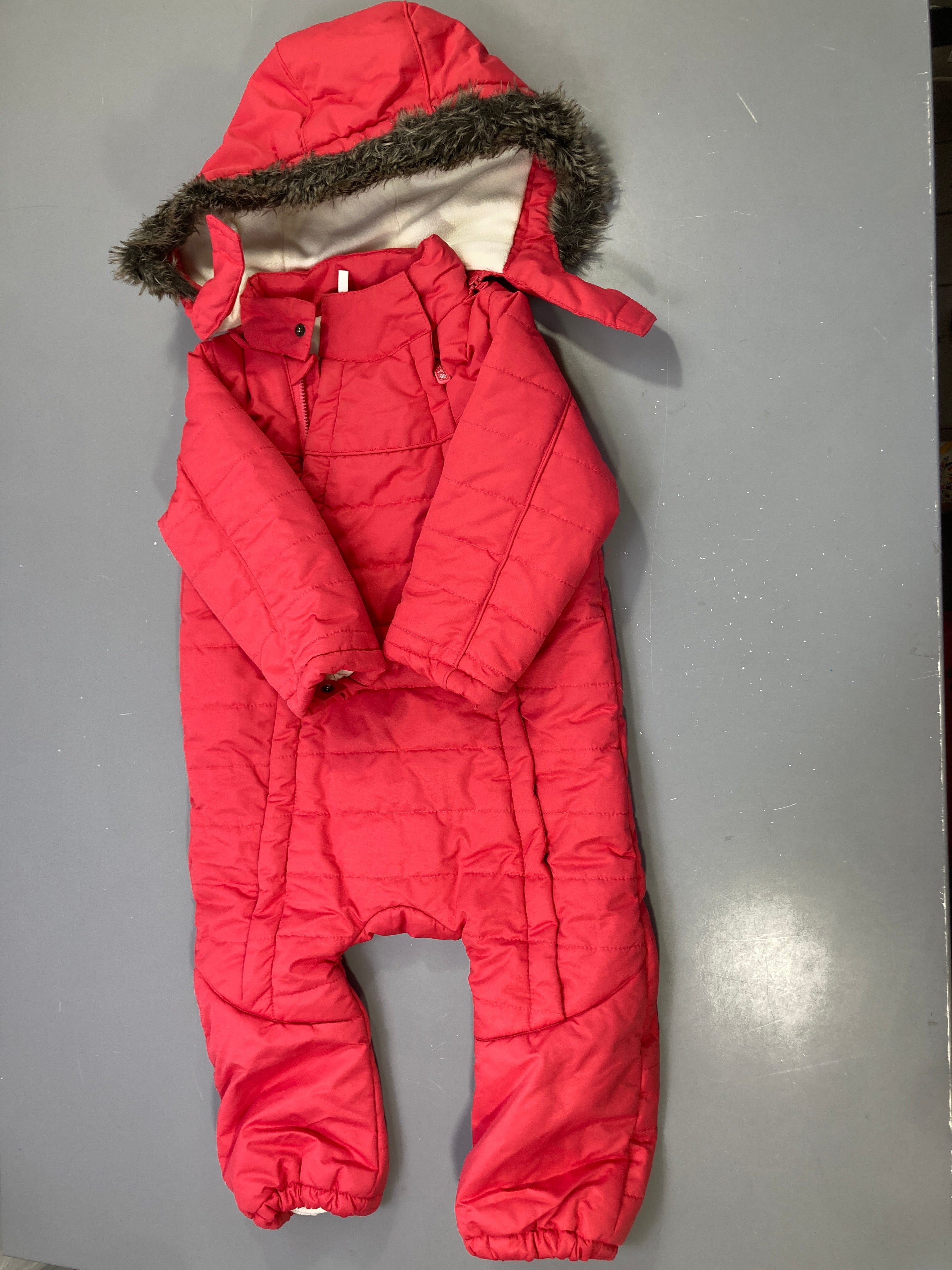 Combinaison pilote rose zippée matelassée, capuche bordure fausse fourrure, doublure polaire