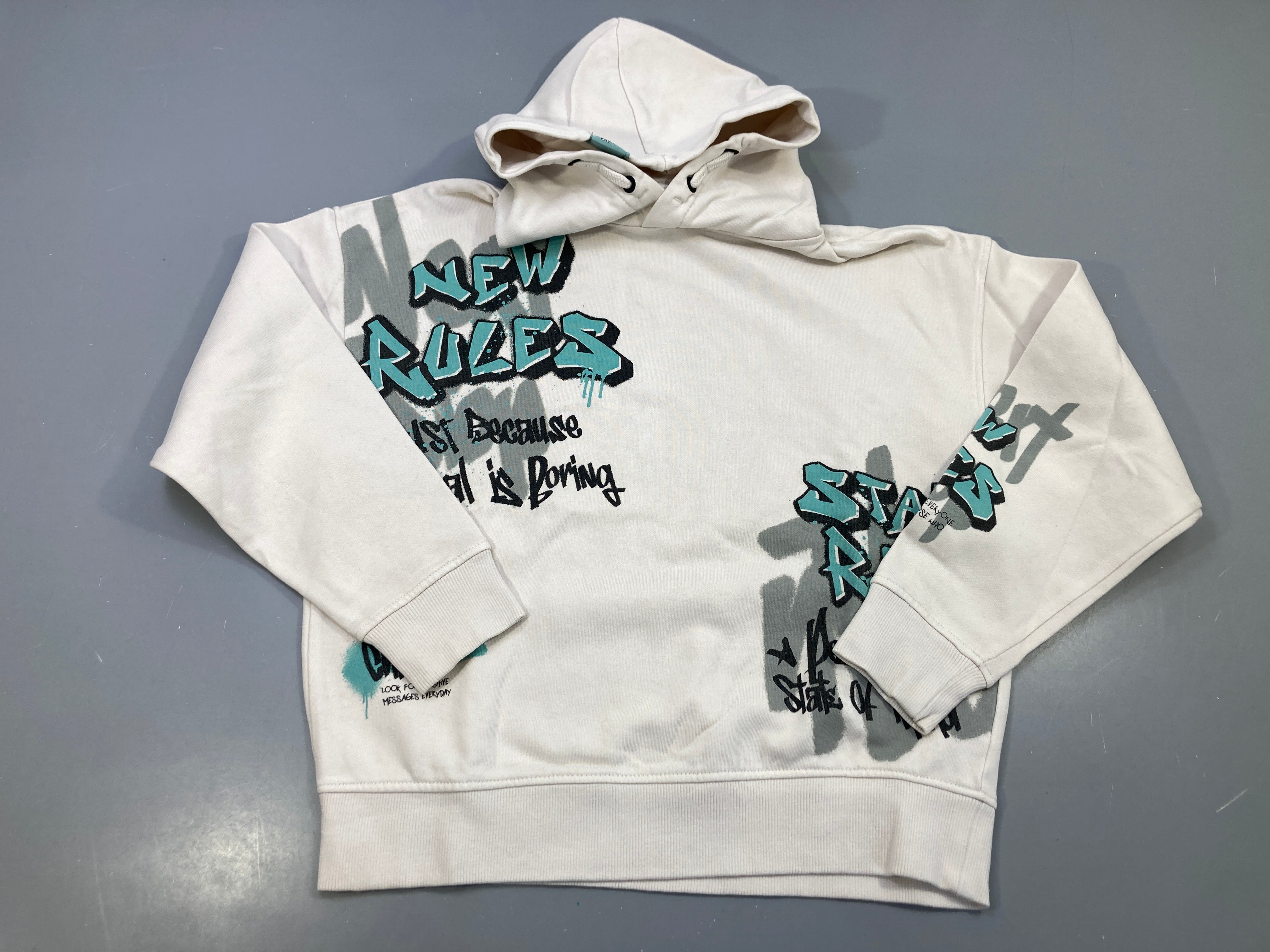 Sweat capuche grisé molleton, graffitis New rules vert d'eau