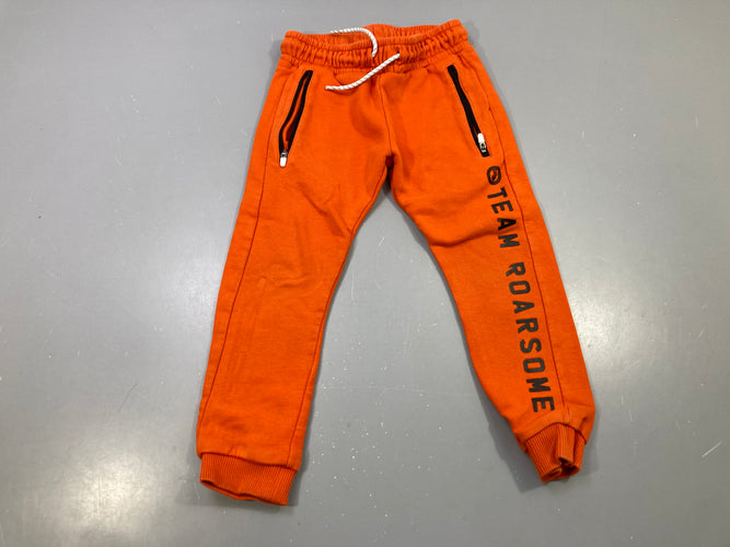 Pantalon molleton orange jogging, poches zippées, imprimé Team Roarsome Légères taches, moins cher chez Petit Kiwi