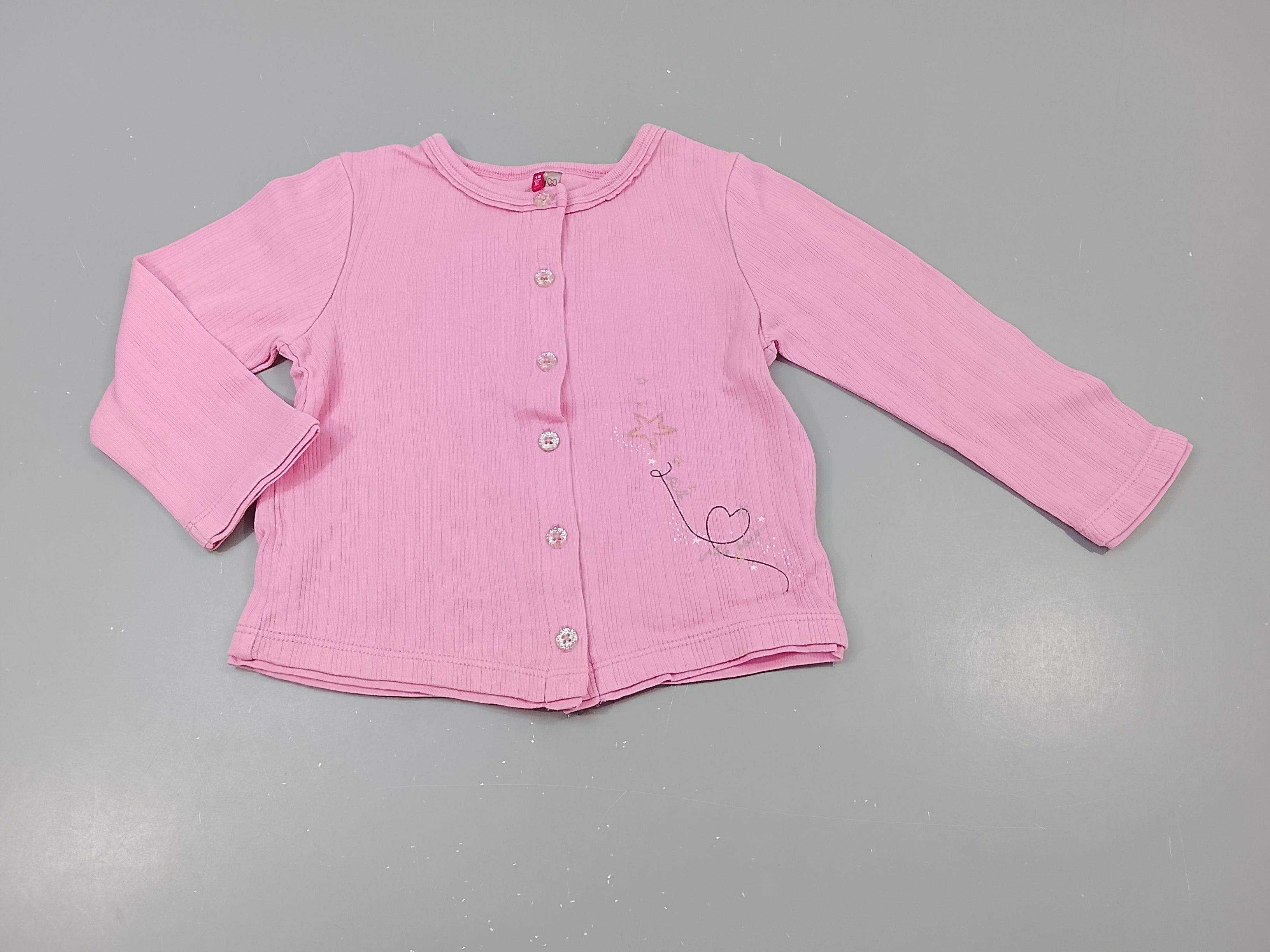 Gilet rose texturé,boutons pailletés