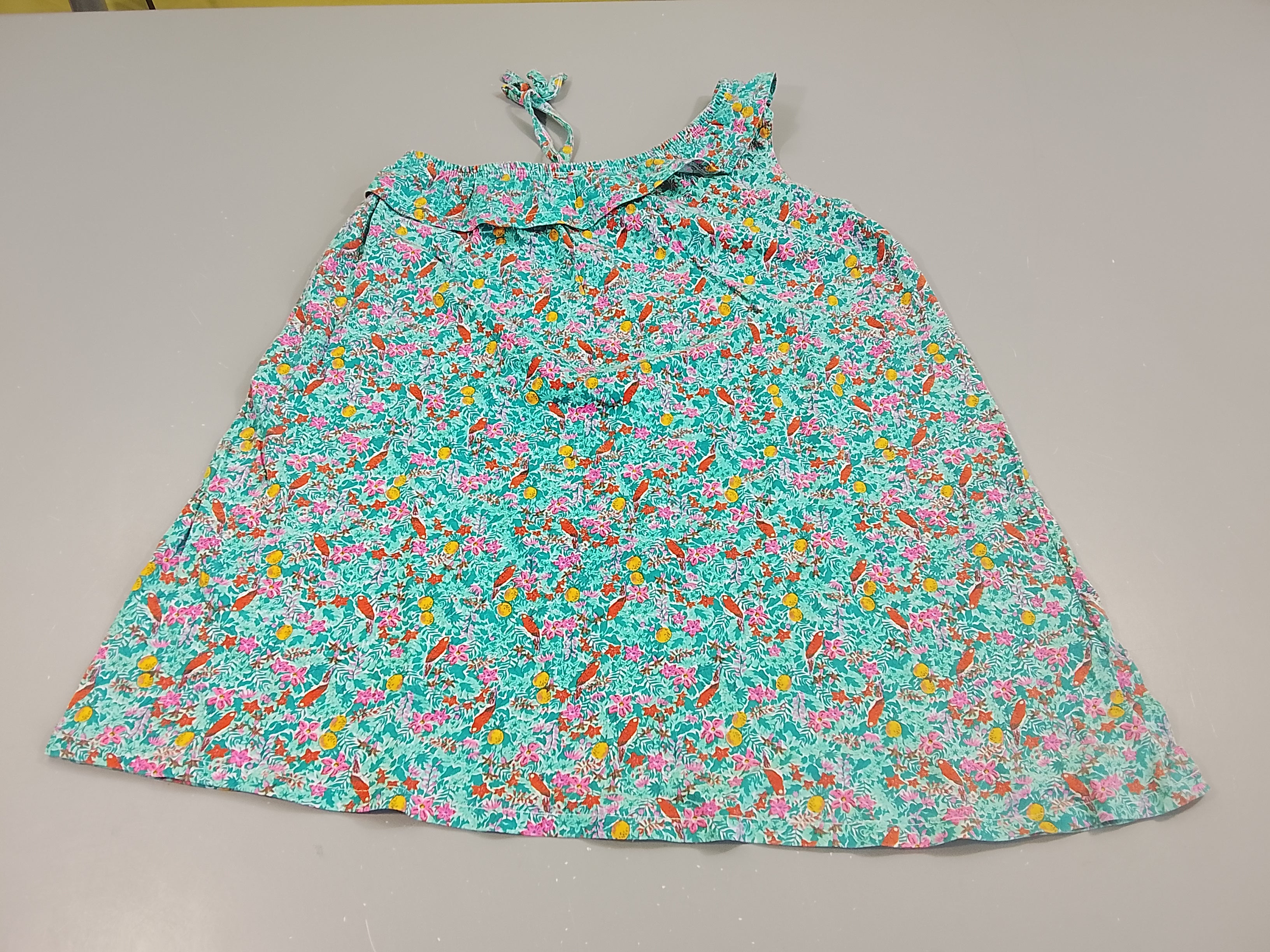 Robe assymétrique fines bretelles bleu turquoise à motifs tropical