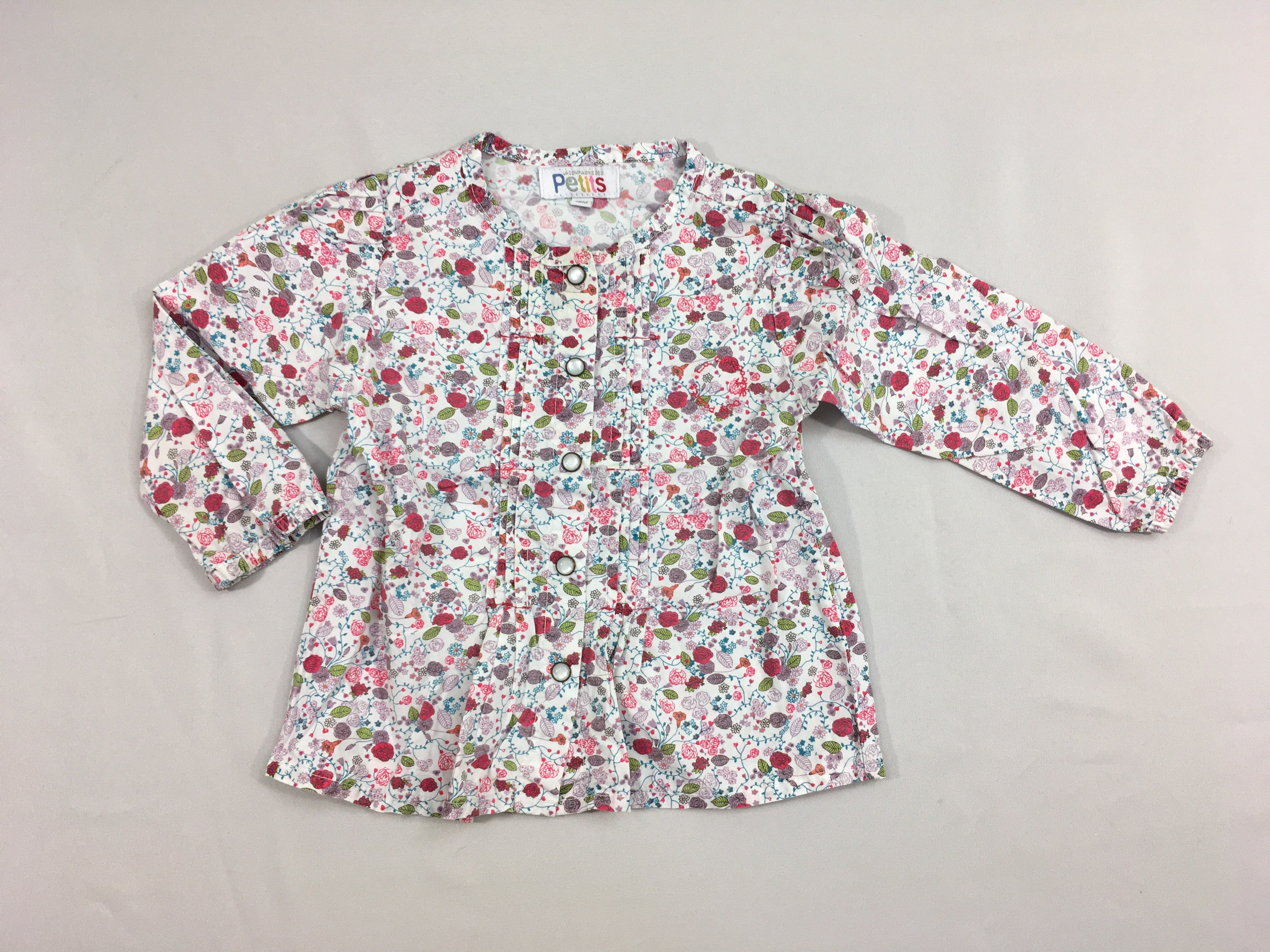 Chemisier blanc fleuri rose