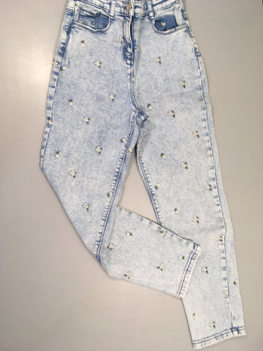 Jeans clair fleuri texturé, moins cher chez Petit Kiwi