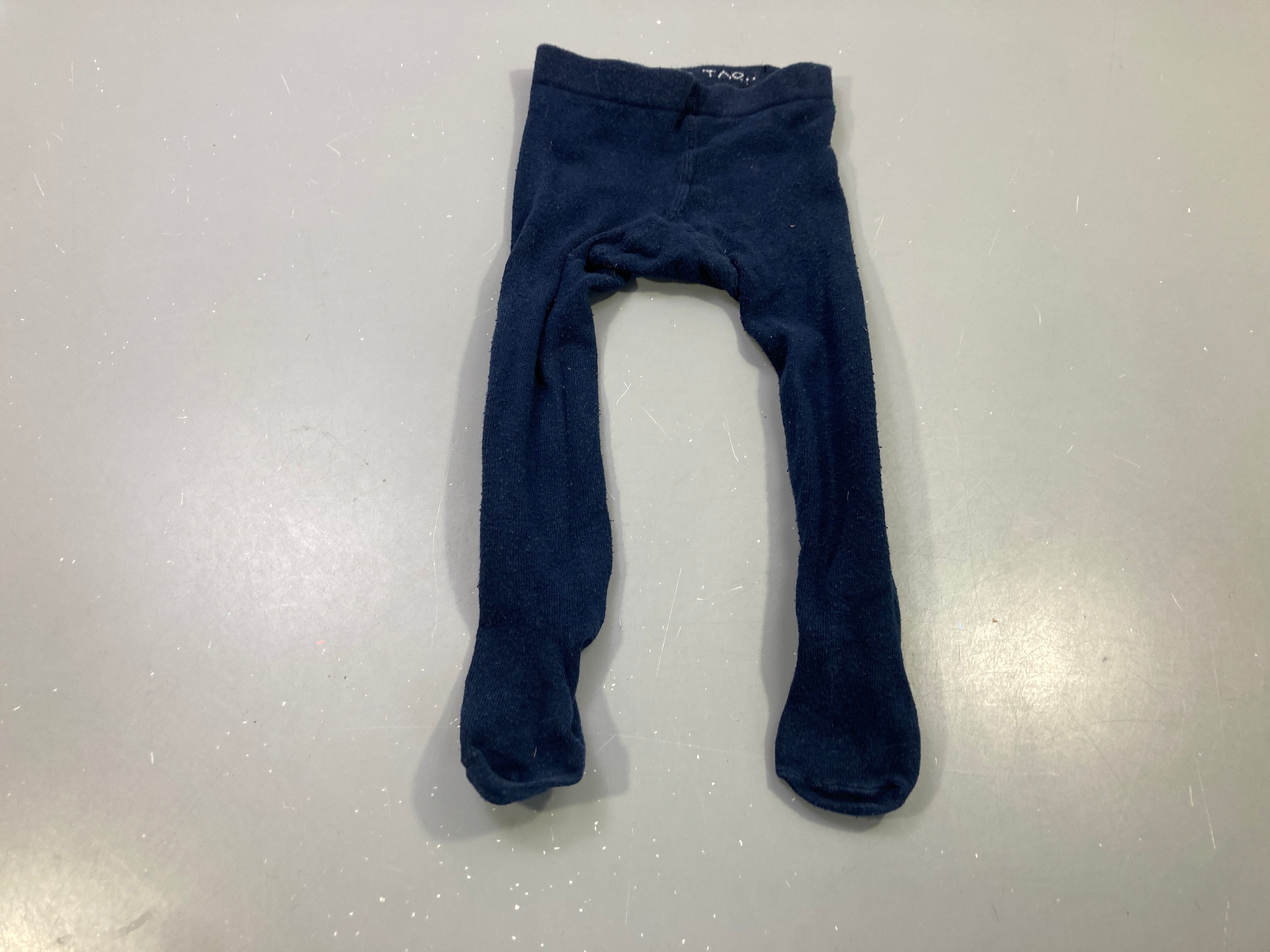 Collants bleu marine , légèrement bouloché 21-23