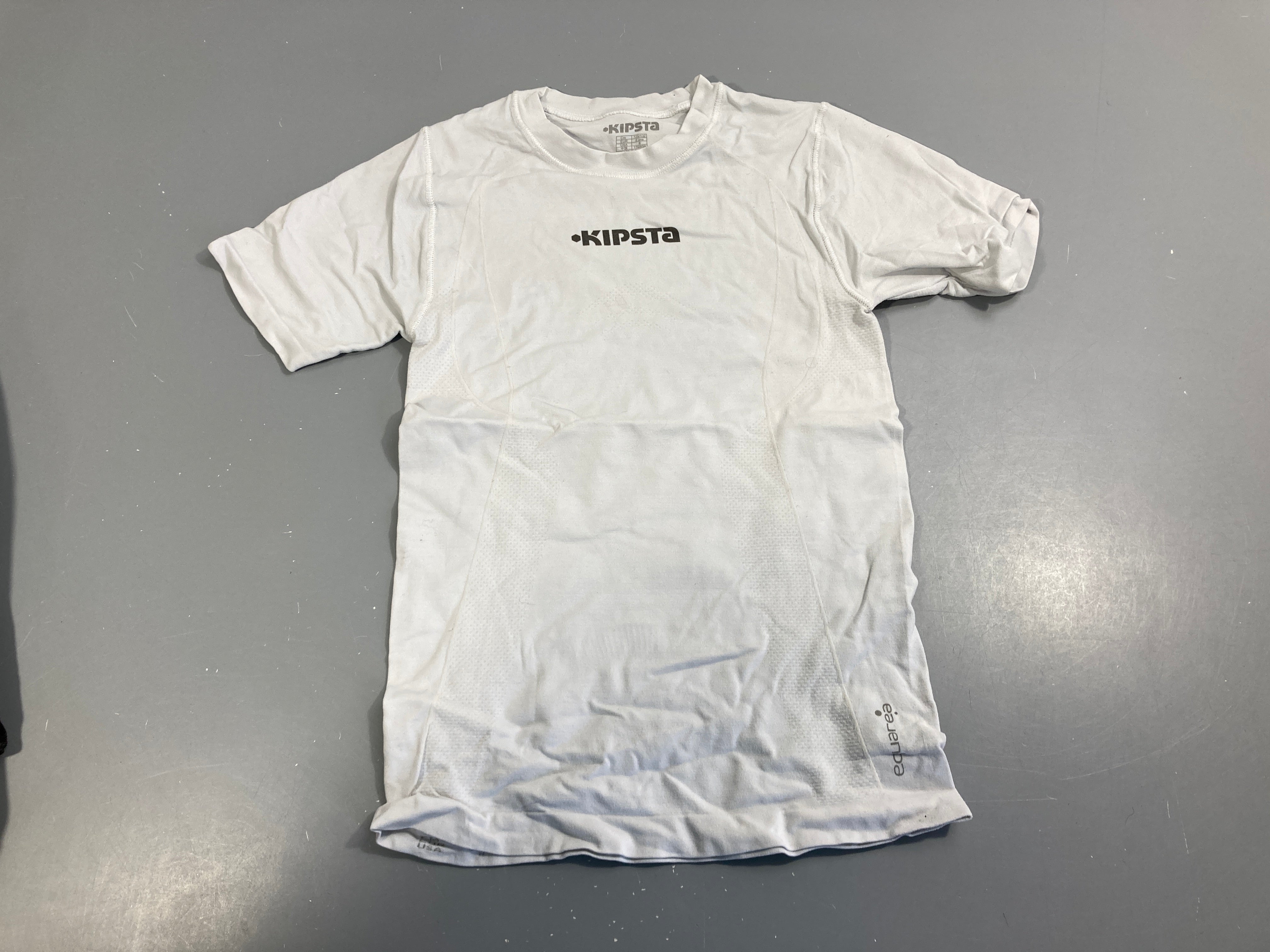 T-shirt m.c de sport blanc Kipsta, un peu grisé