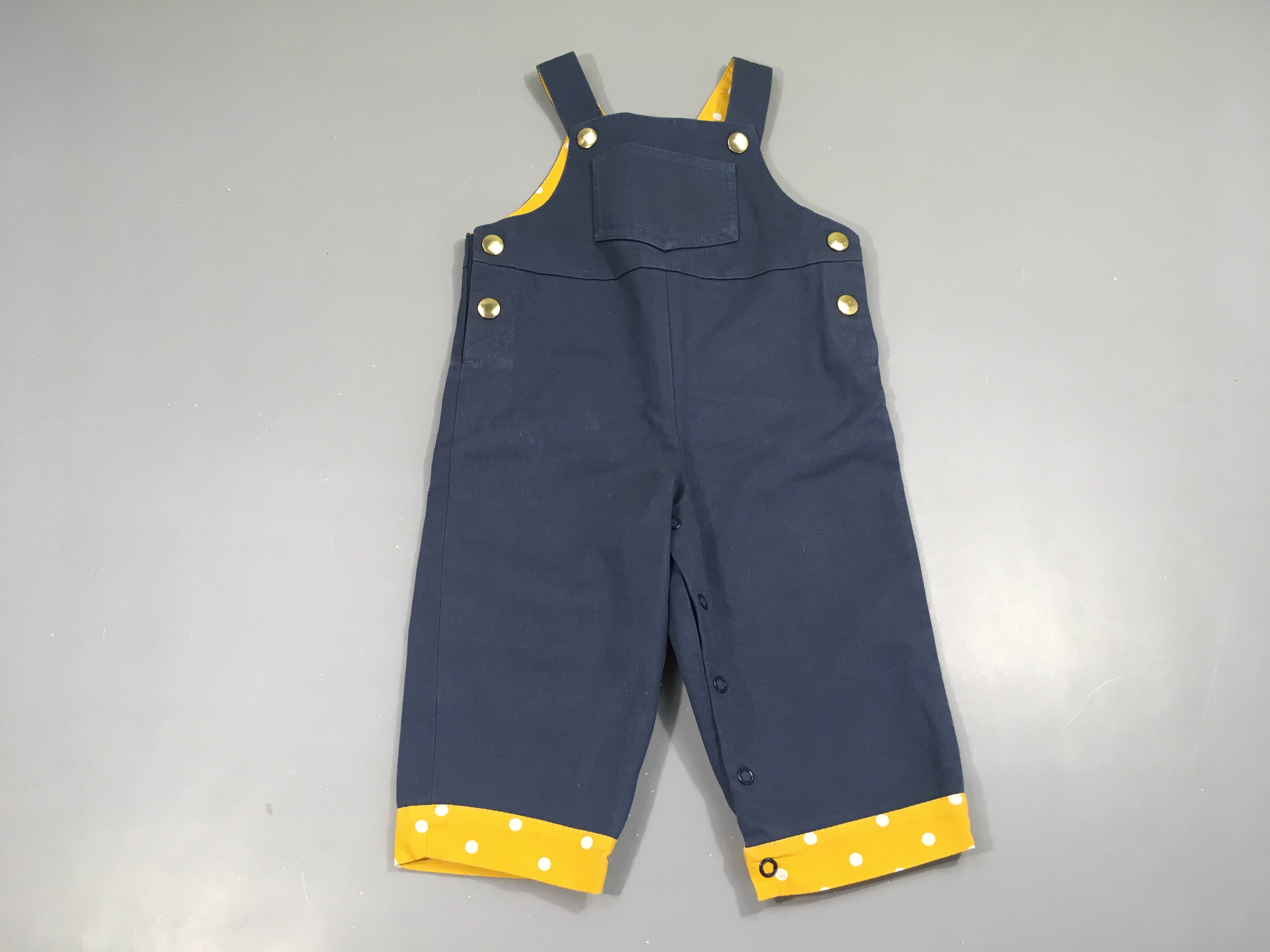 Etat neuf salopette bleu foncé revers jaune pois
