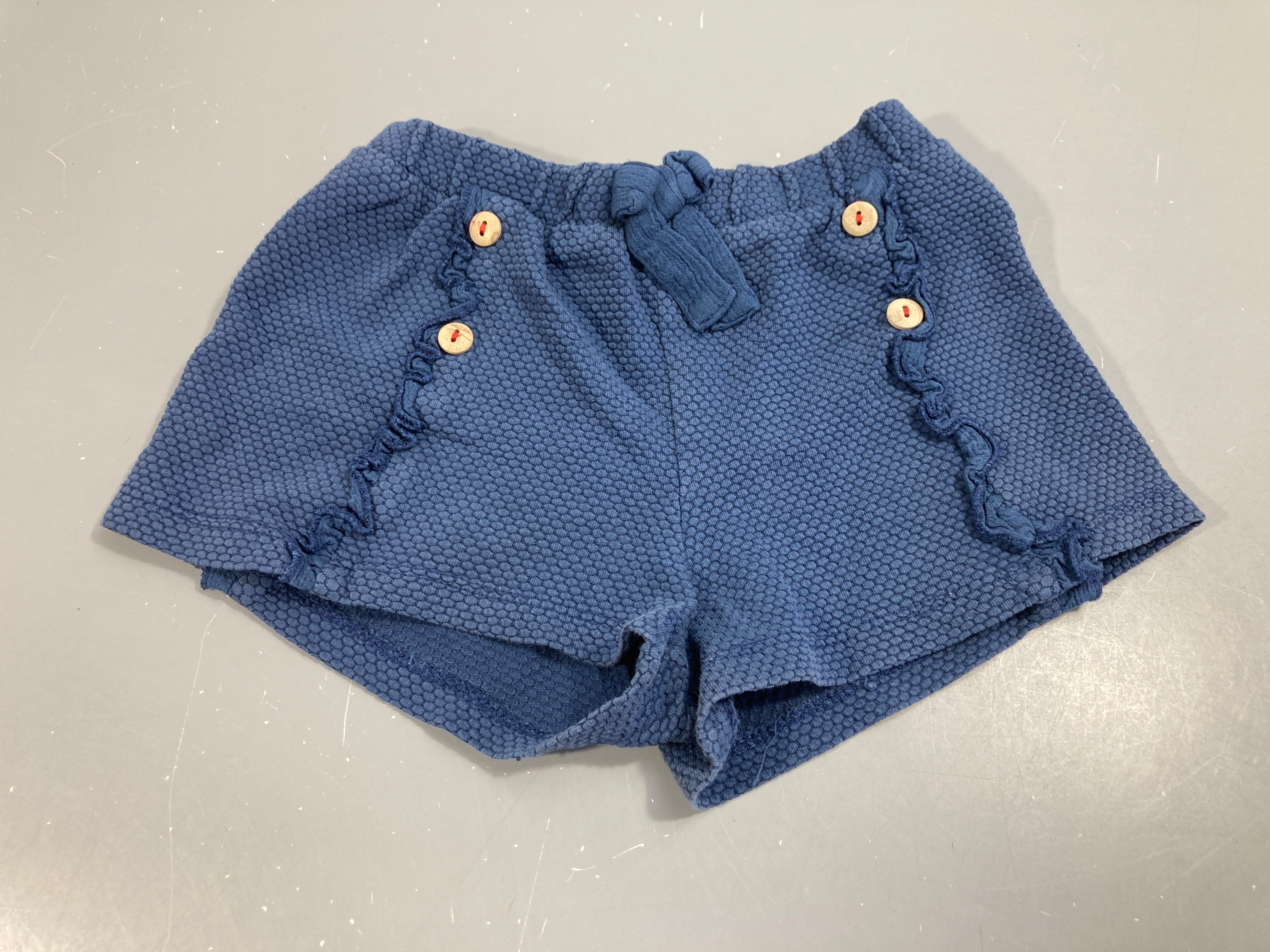 Short bleu tissu texturé