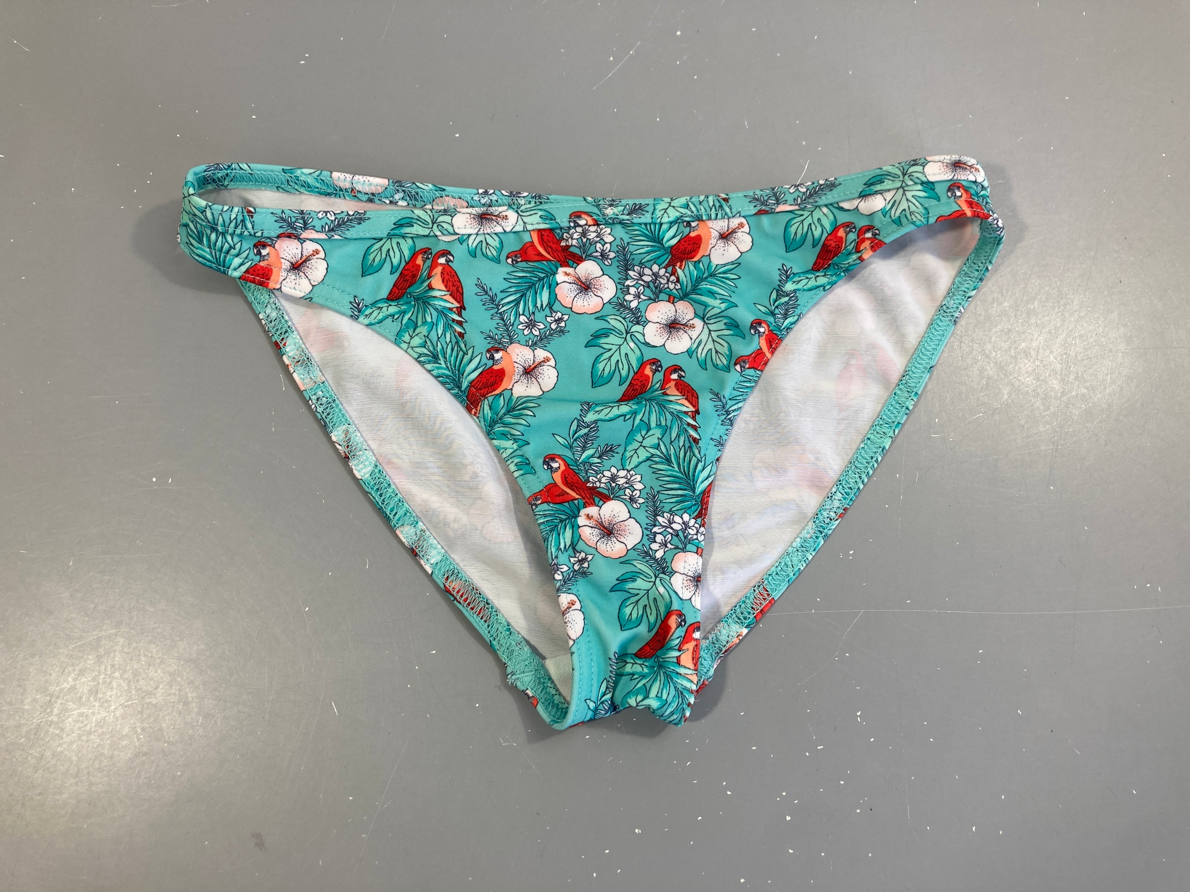 Culotte de bain turquoise péroquets Taille estimée Olaian