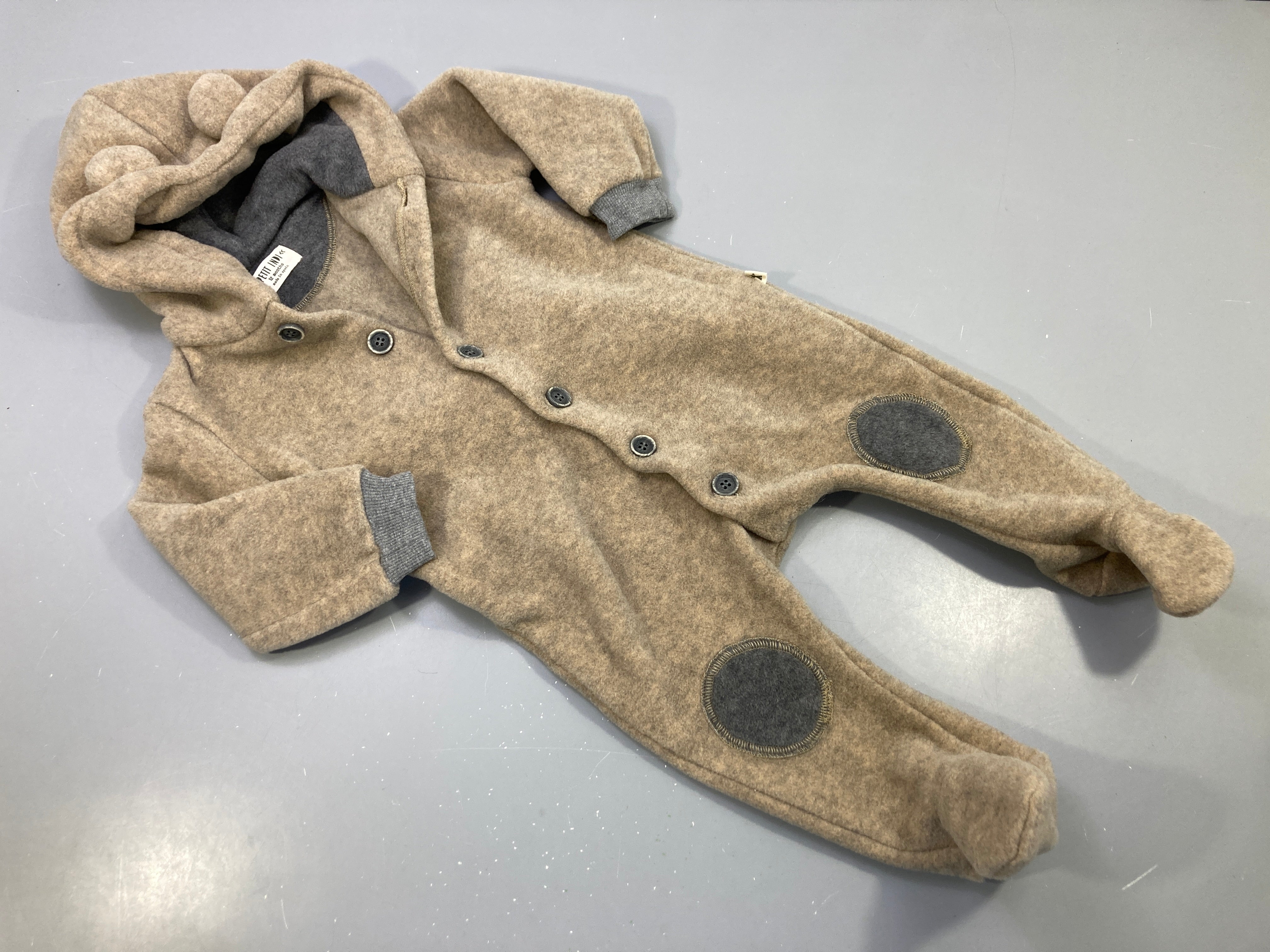 Combi pilote à capuche  en polaire beige chiné. Petit Indi