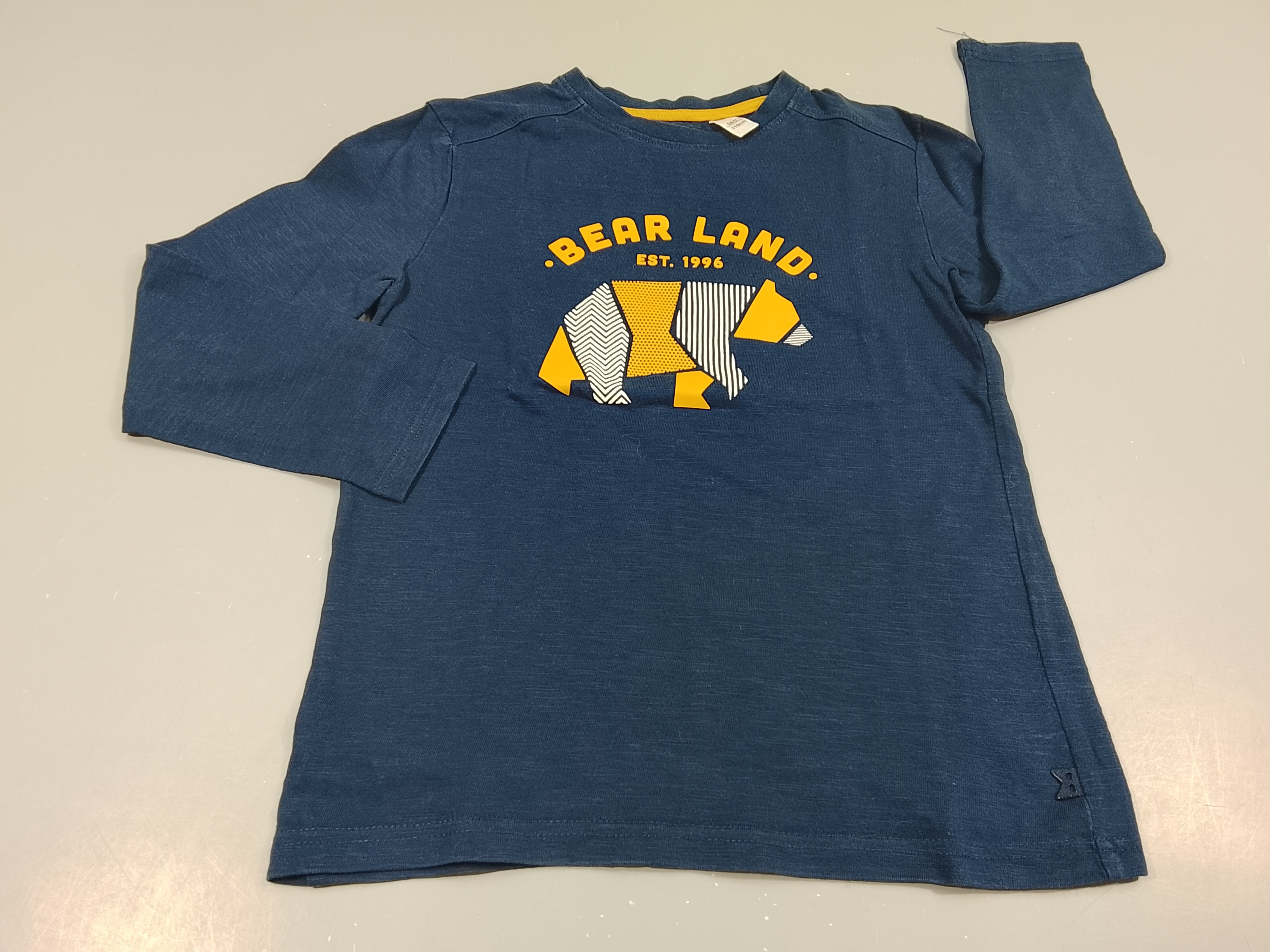 T-shirt m.l bleu marine flammé motif géographique ours jaune et blanc 