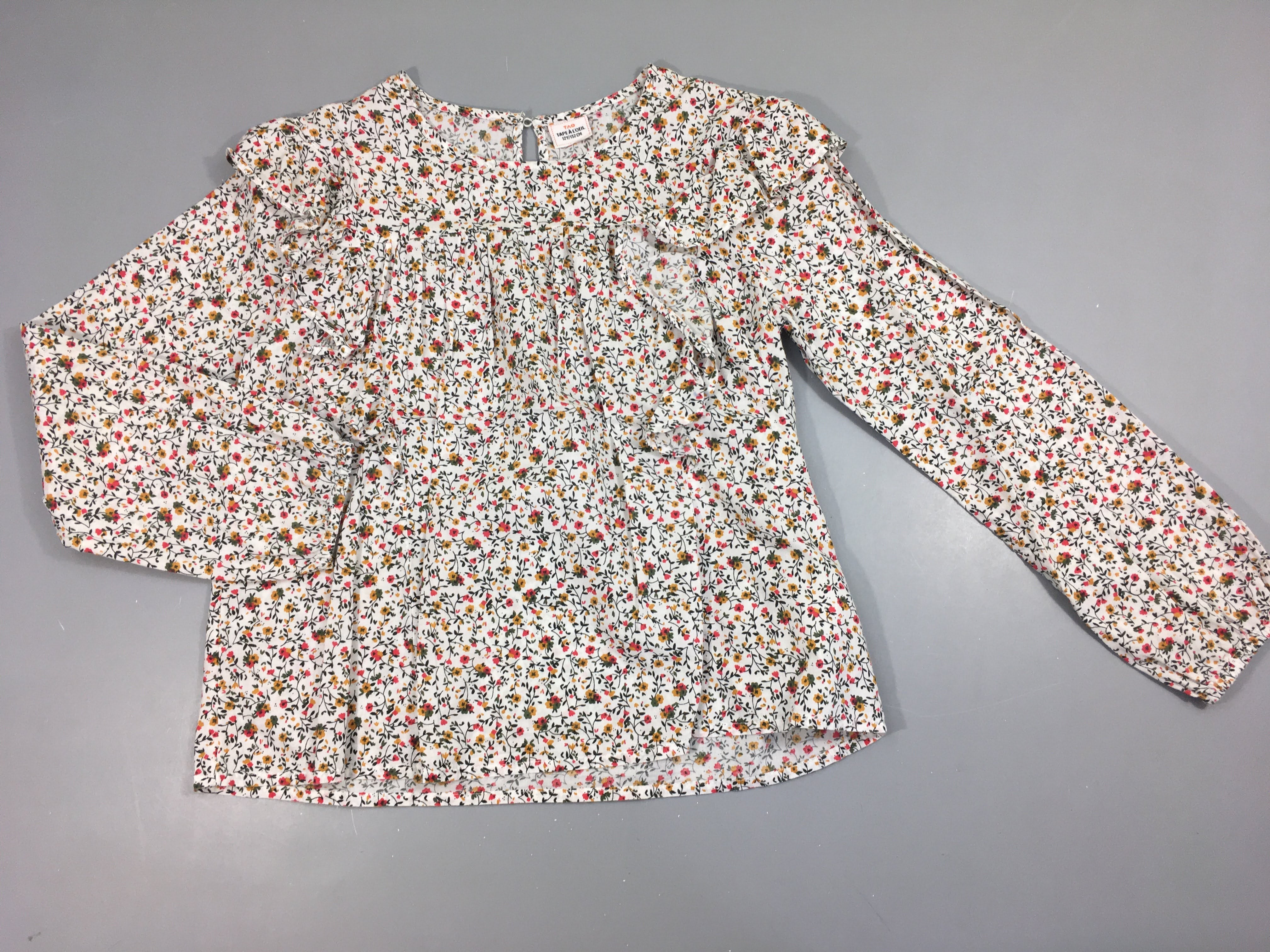 Blouse m.l blanche fleurie froufrous