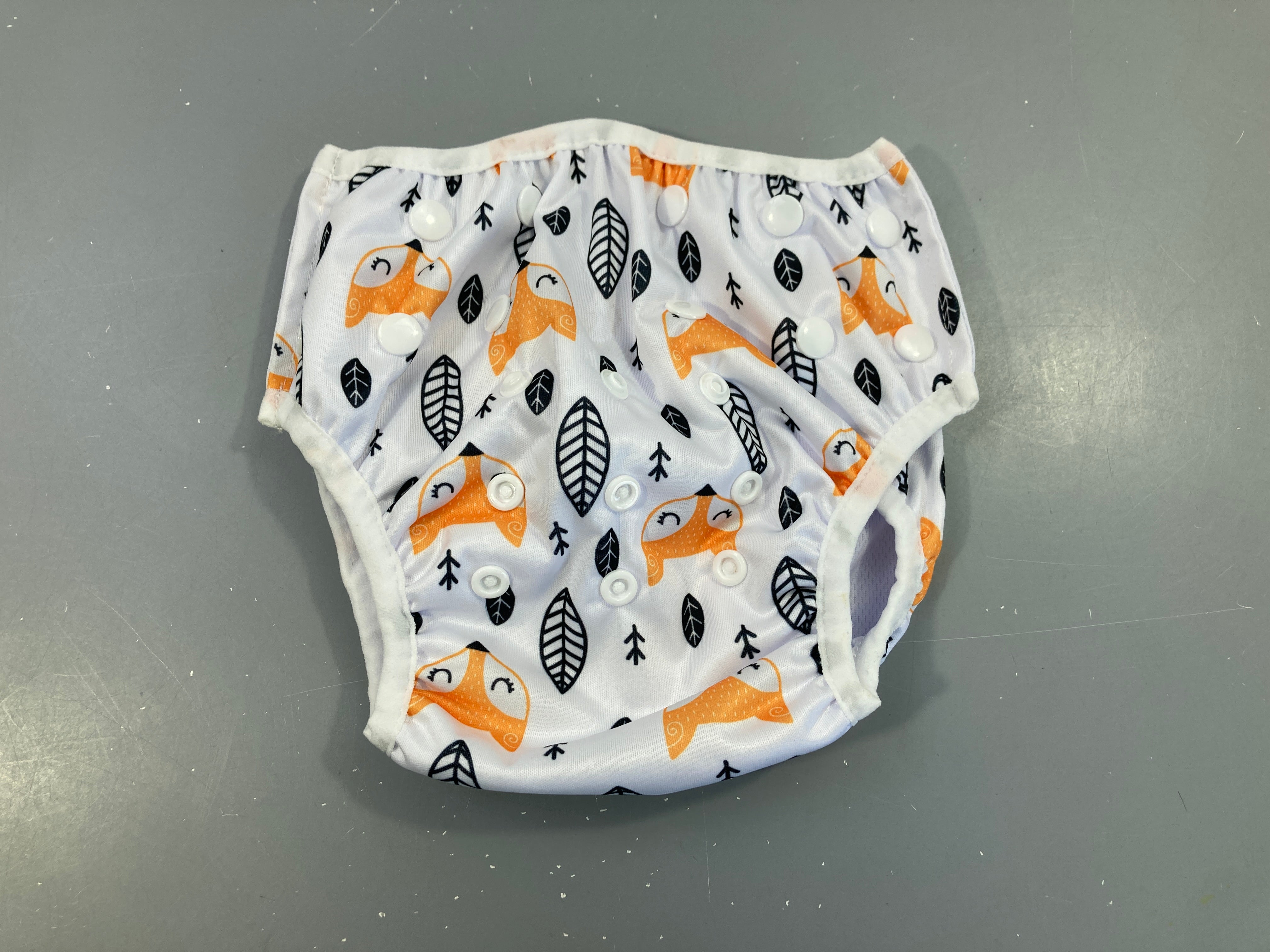 culotte de prote.ction couche lavable évolutive blanche renard/feuilles pressions