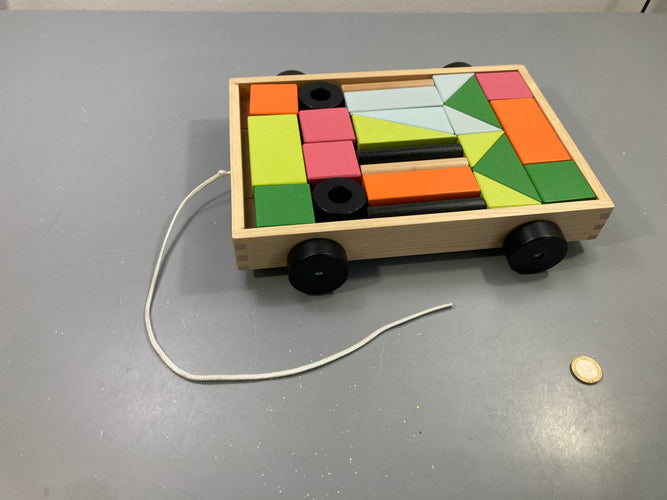 Chariot à tirer en bois avec blocs de construction colorés MULA - complet, moins cher chez Petit Kiwi