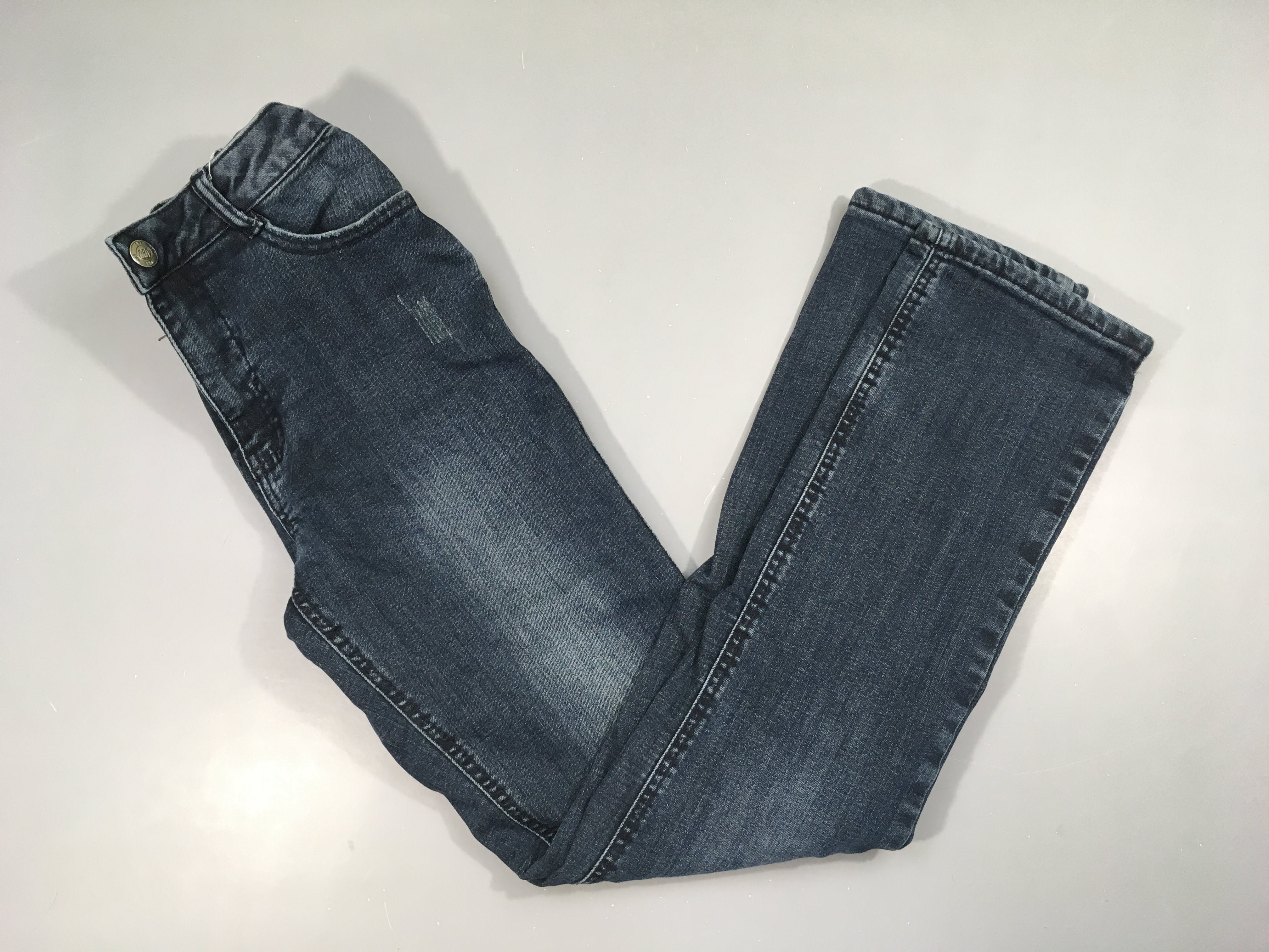 Jeans doublé jersey effet éraillé