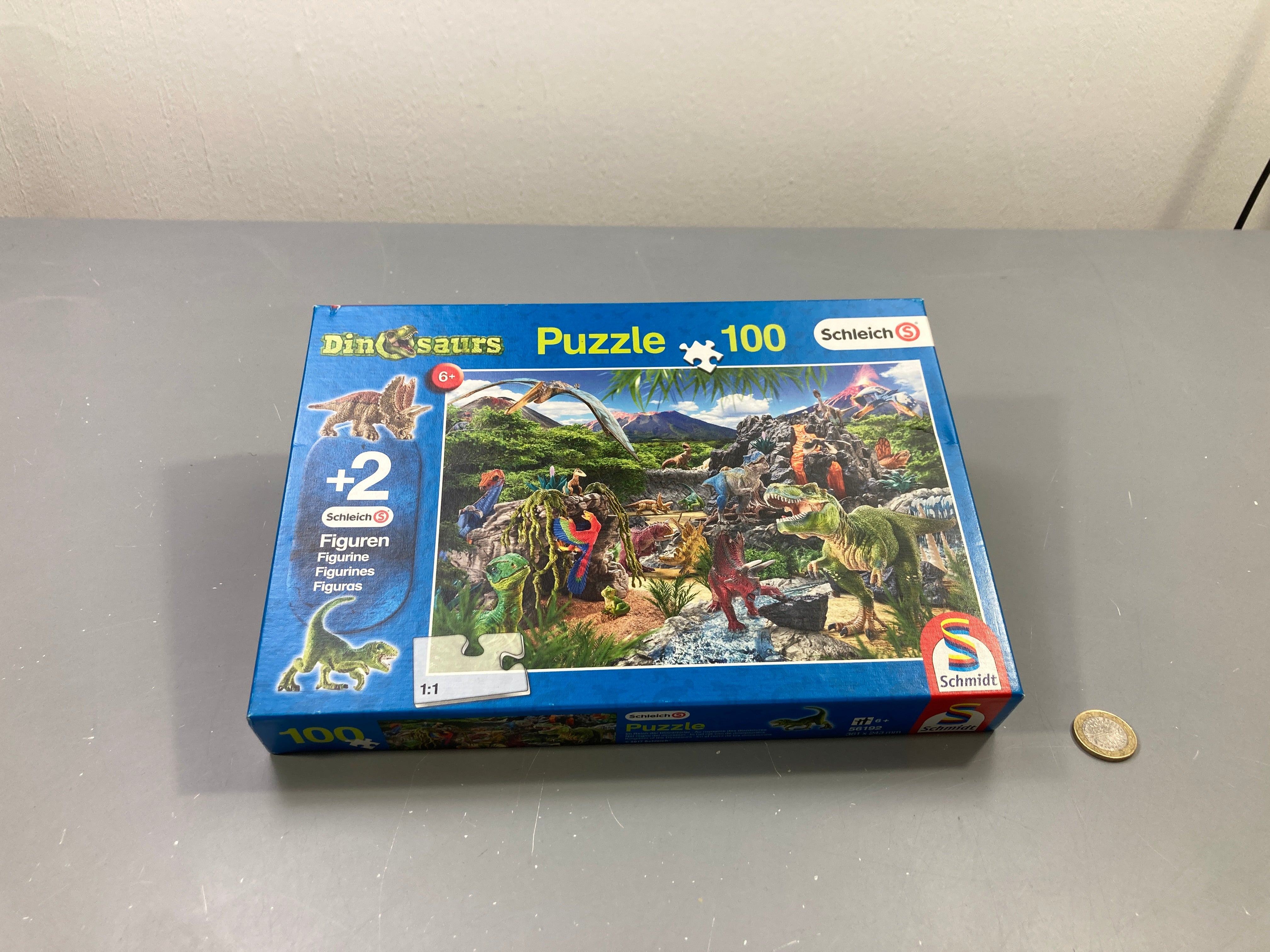 Puzzle 100 pcs Dinosaurs + 2 figurines Schleich, Schmidt