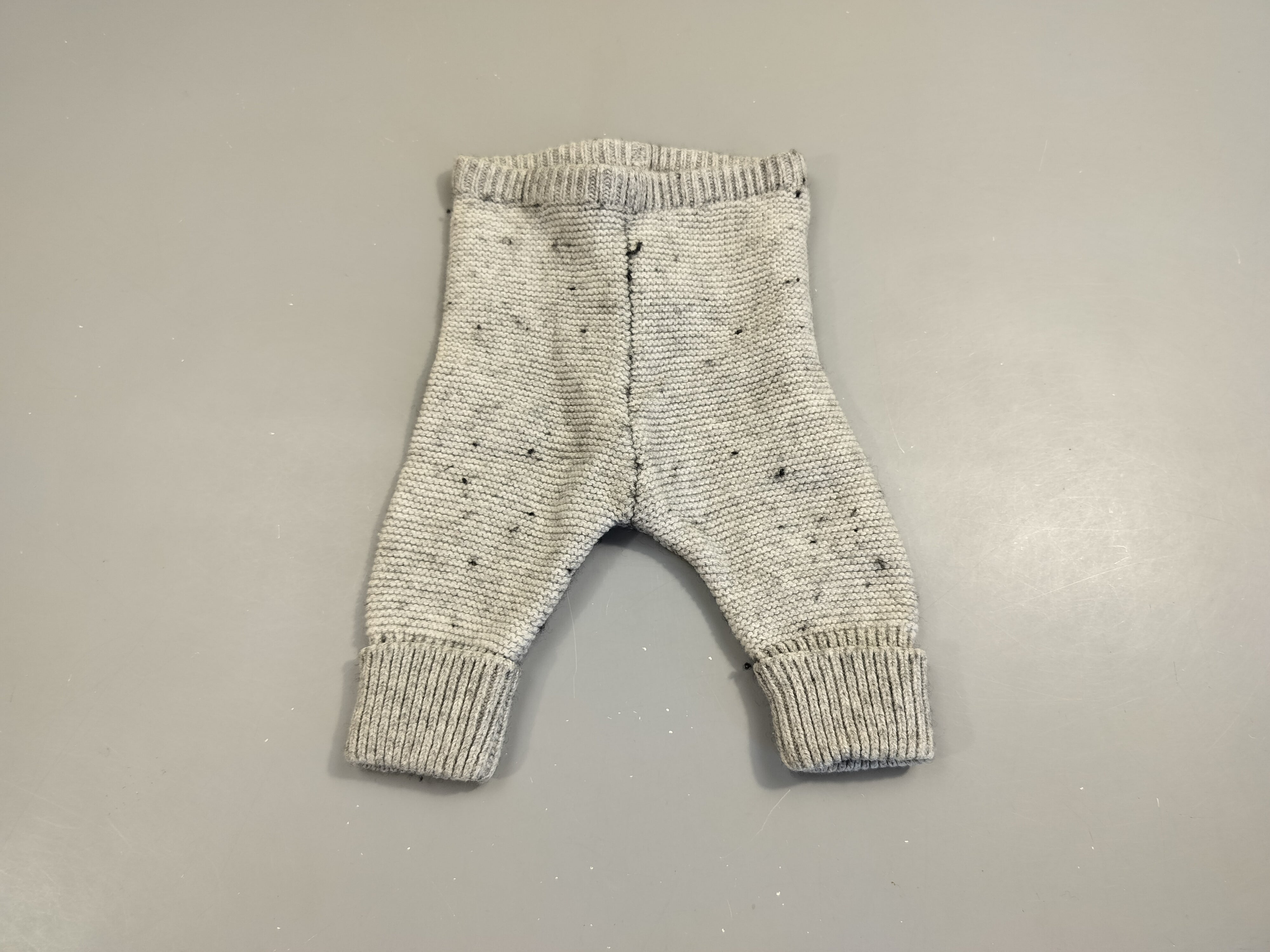Pantalon tricot à revers gris chiné  88% coton  12% laine