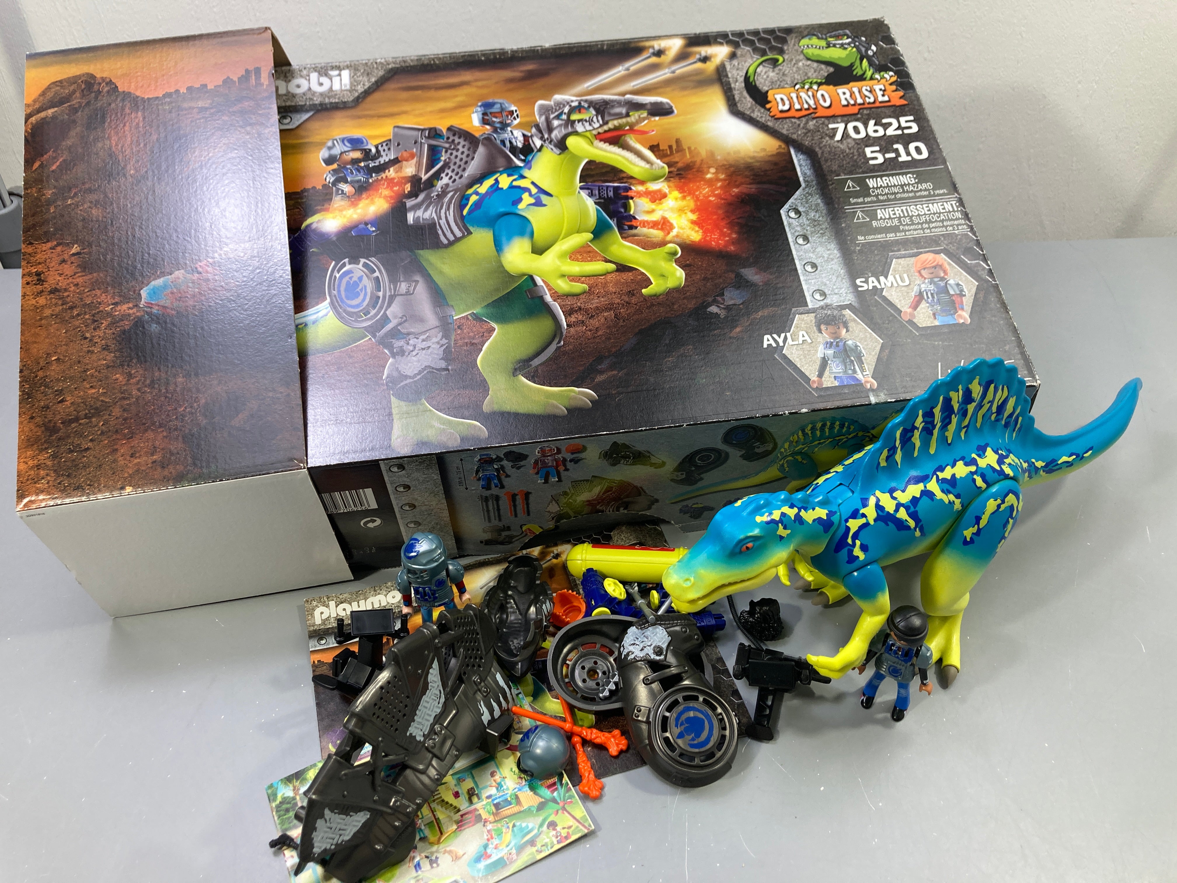 Dino Rise 70625 spinosaure avec 2 figurines, armure, accessoires, boîte et notice - complet
