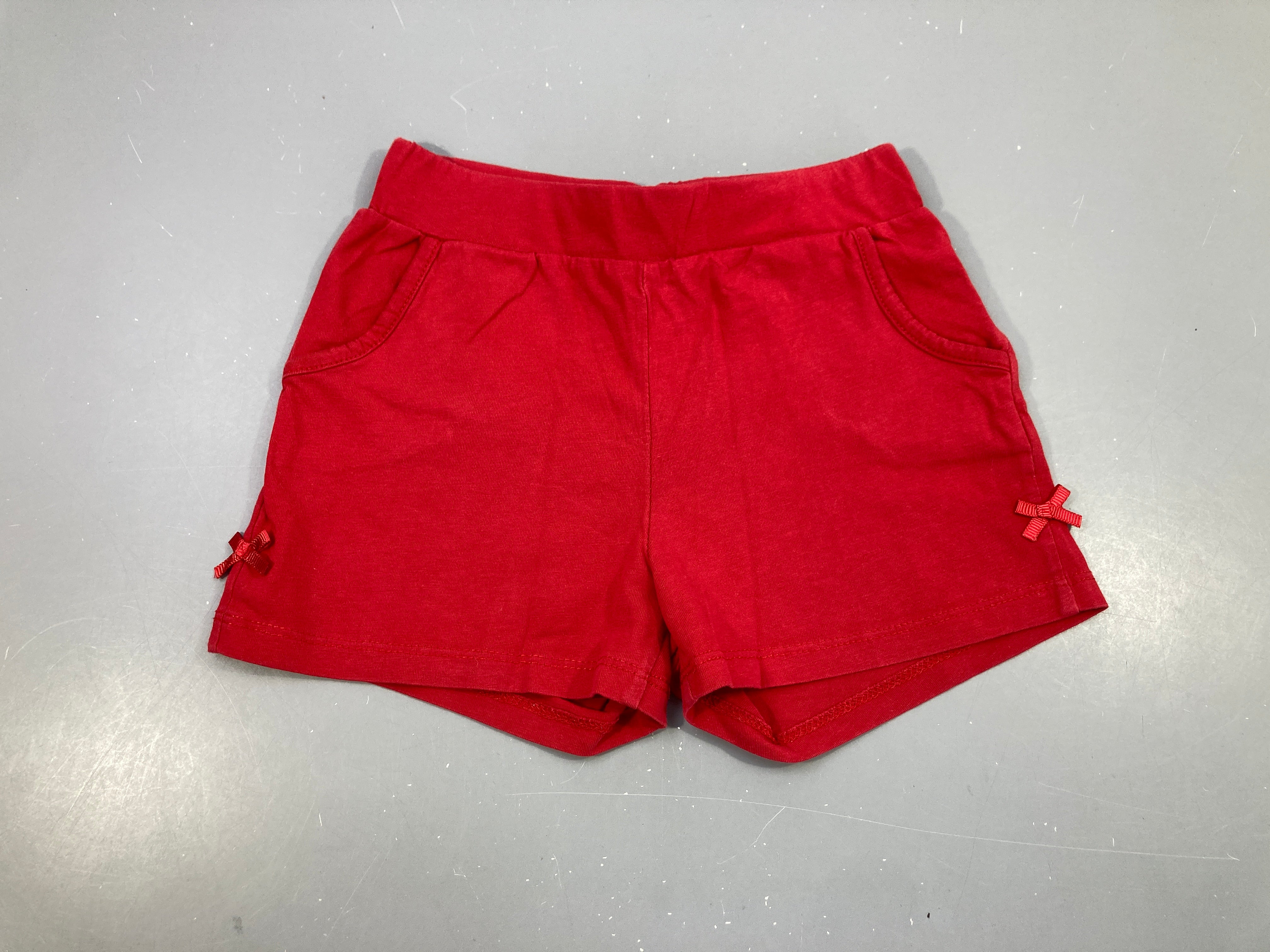 Short rouge jersey noeuds coté Waikiki