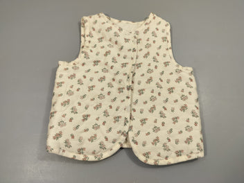 Gilet s.m réversible blanc texturé /blanc texturé à fleurs , pas de taille indiquée , estimée 12m
