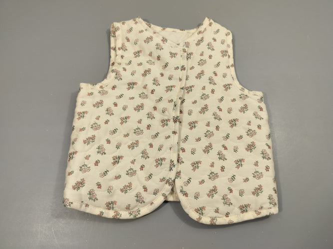 Gilet s.m réversible blanc texturé /blanc texturé à fleurs , pas de taille indiquée , estimée 12m, moins cher chez Petit Kiwi