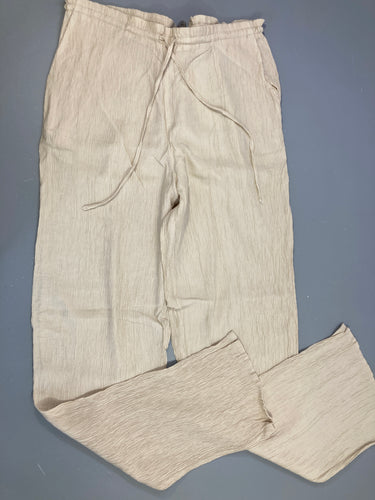 Pantalon fluide beige texturé, moins cher chez Petit Kiwi