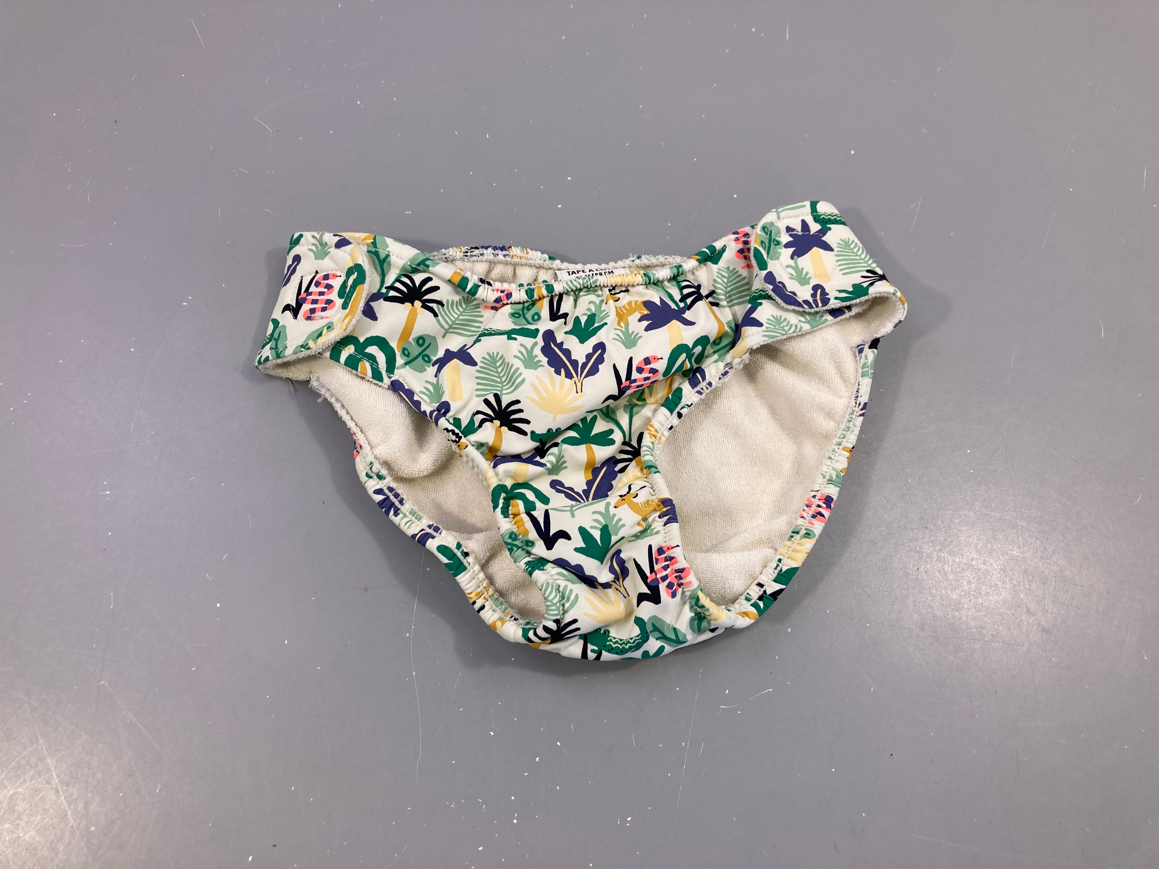 Maillot cullote d'apprentissage écru palmier blancs animaux