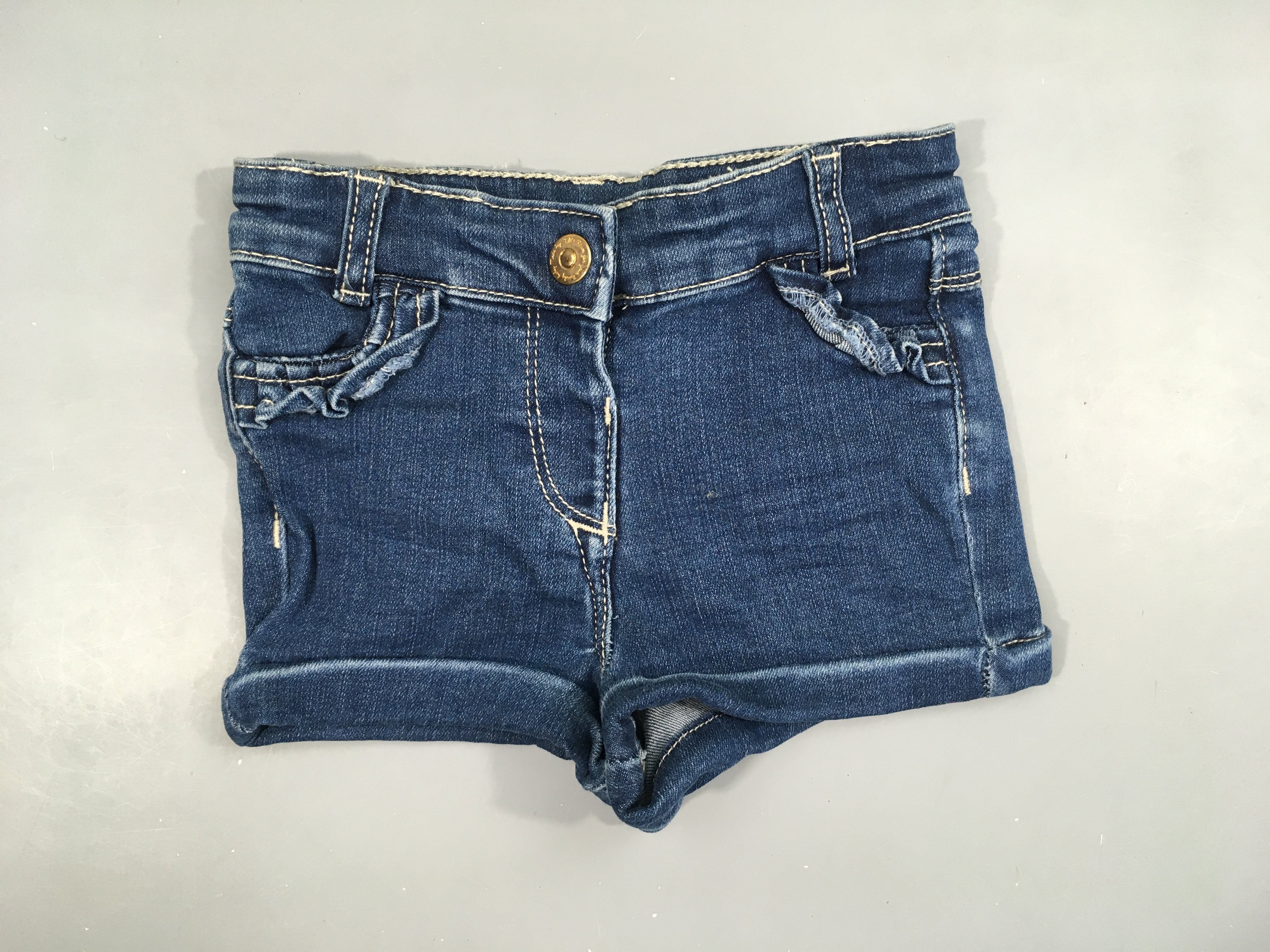 Short en jean à revers froufrou poche