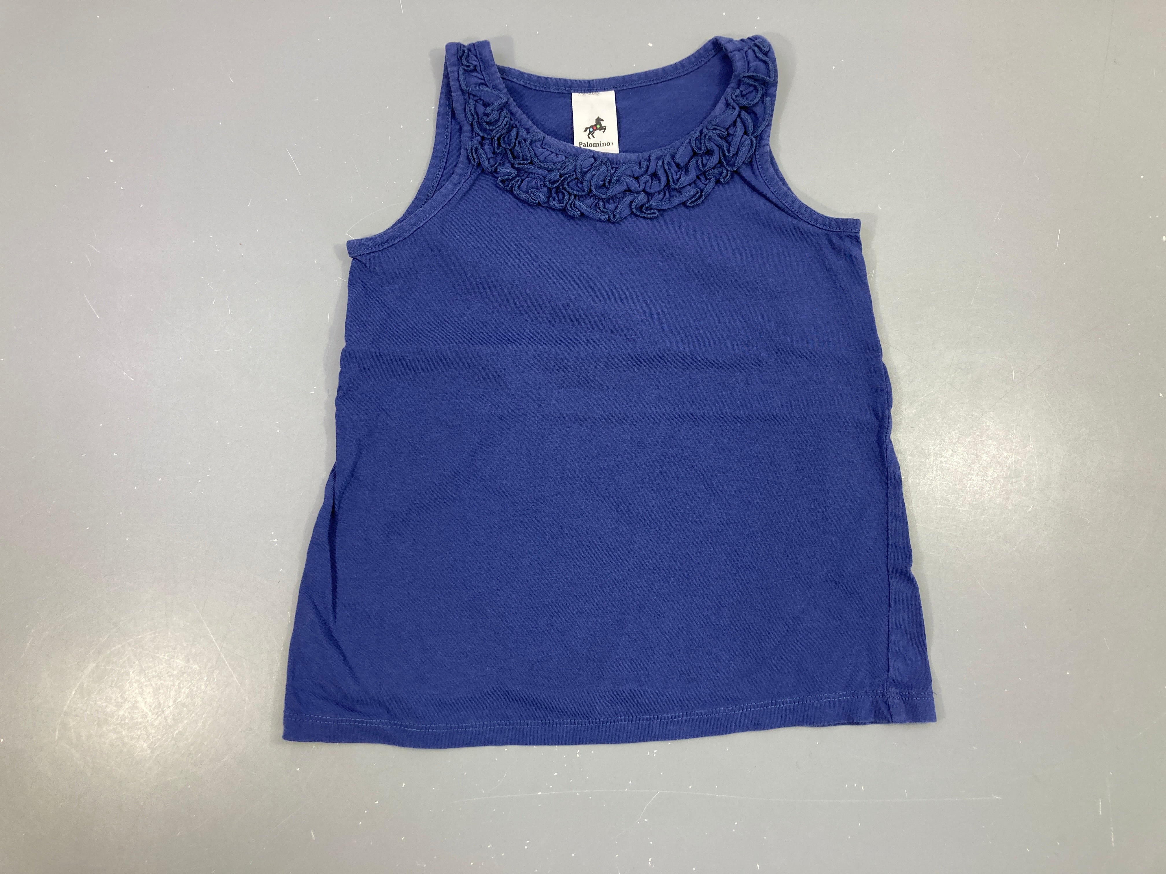 Débardeur bleu foncé froufrous, légèrement bouloché