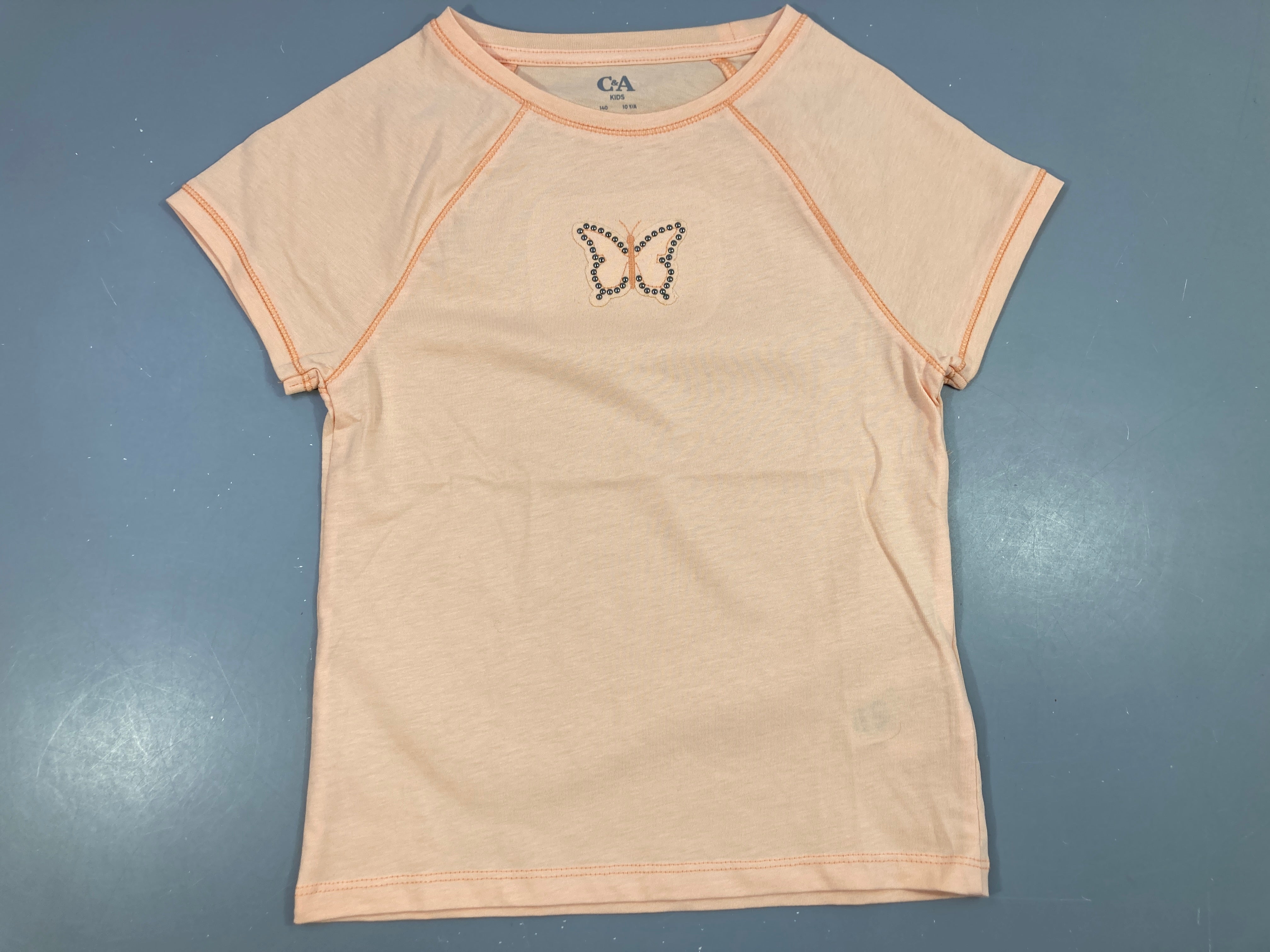 T-shirt m.c orange papillon clous