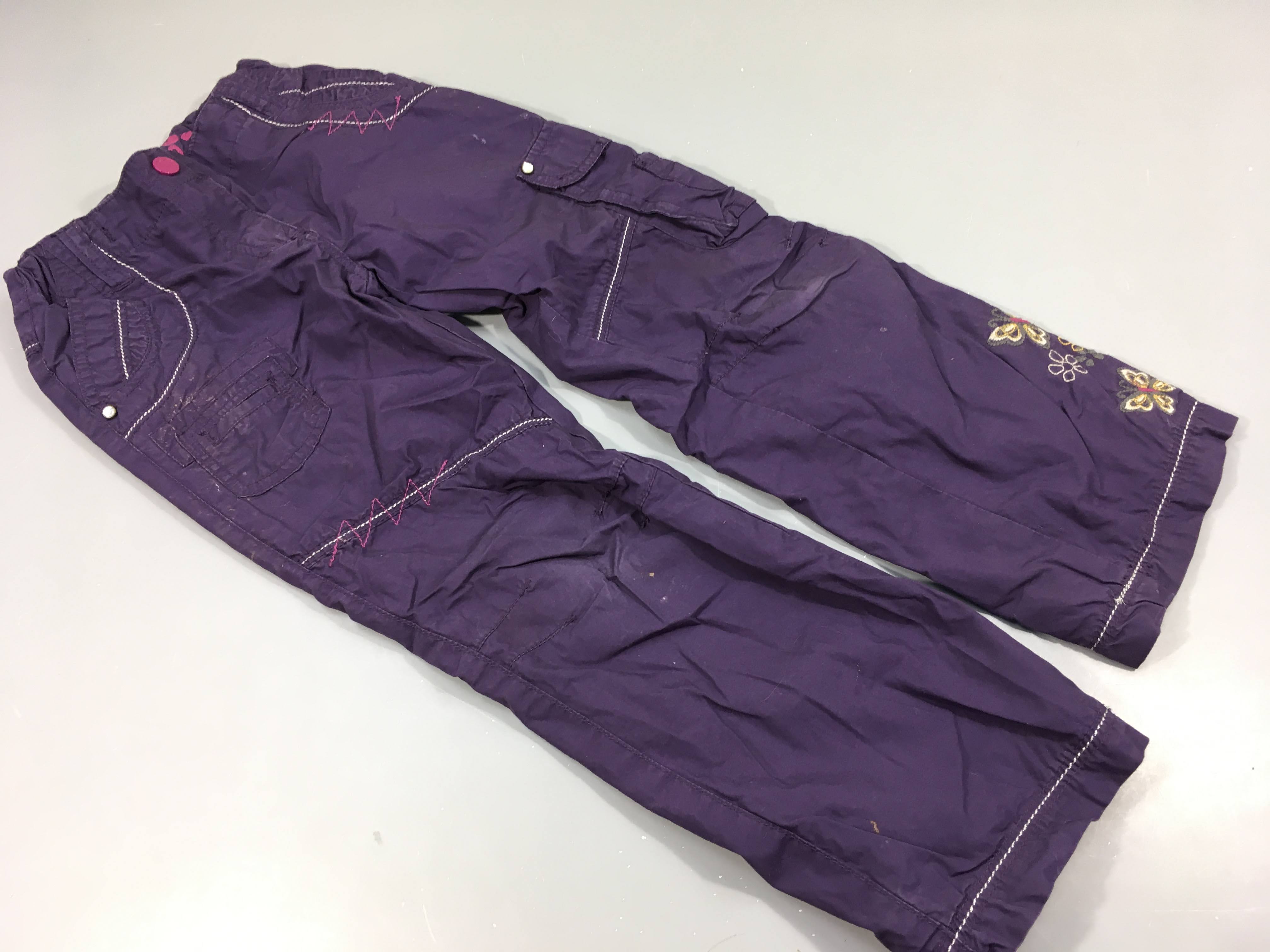 Pantalon mauve , broderies fleurs et papillons, doublé jersey. Taché, à relaver