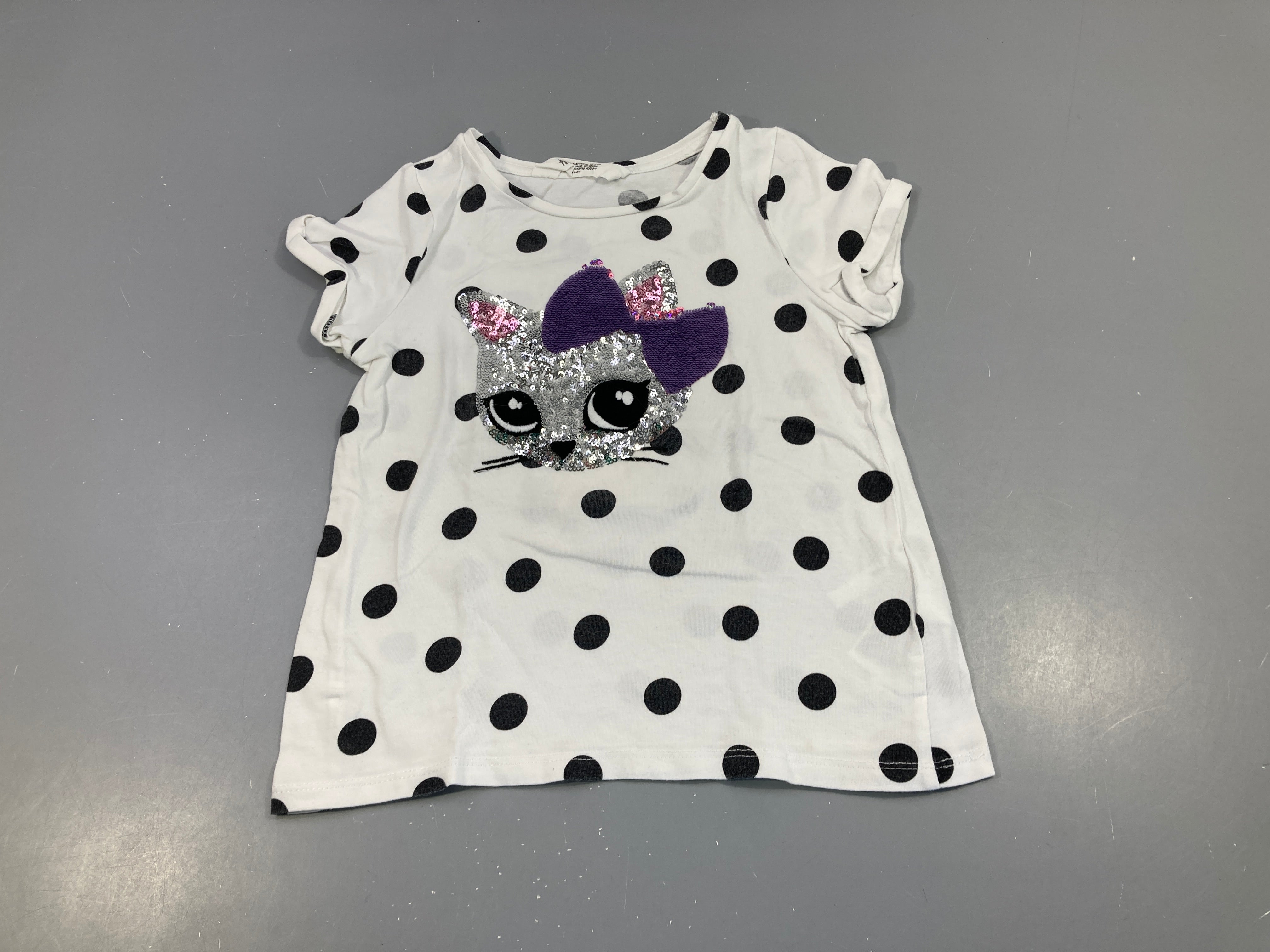 T-shirt m.c blanc pois noir chat sequins réversibles, légèrement bouloché
