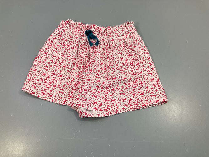 Short jersey rose fleurs blanches, moins cher chez Petit Kiwi
