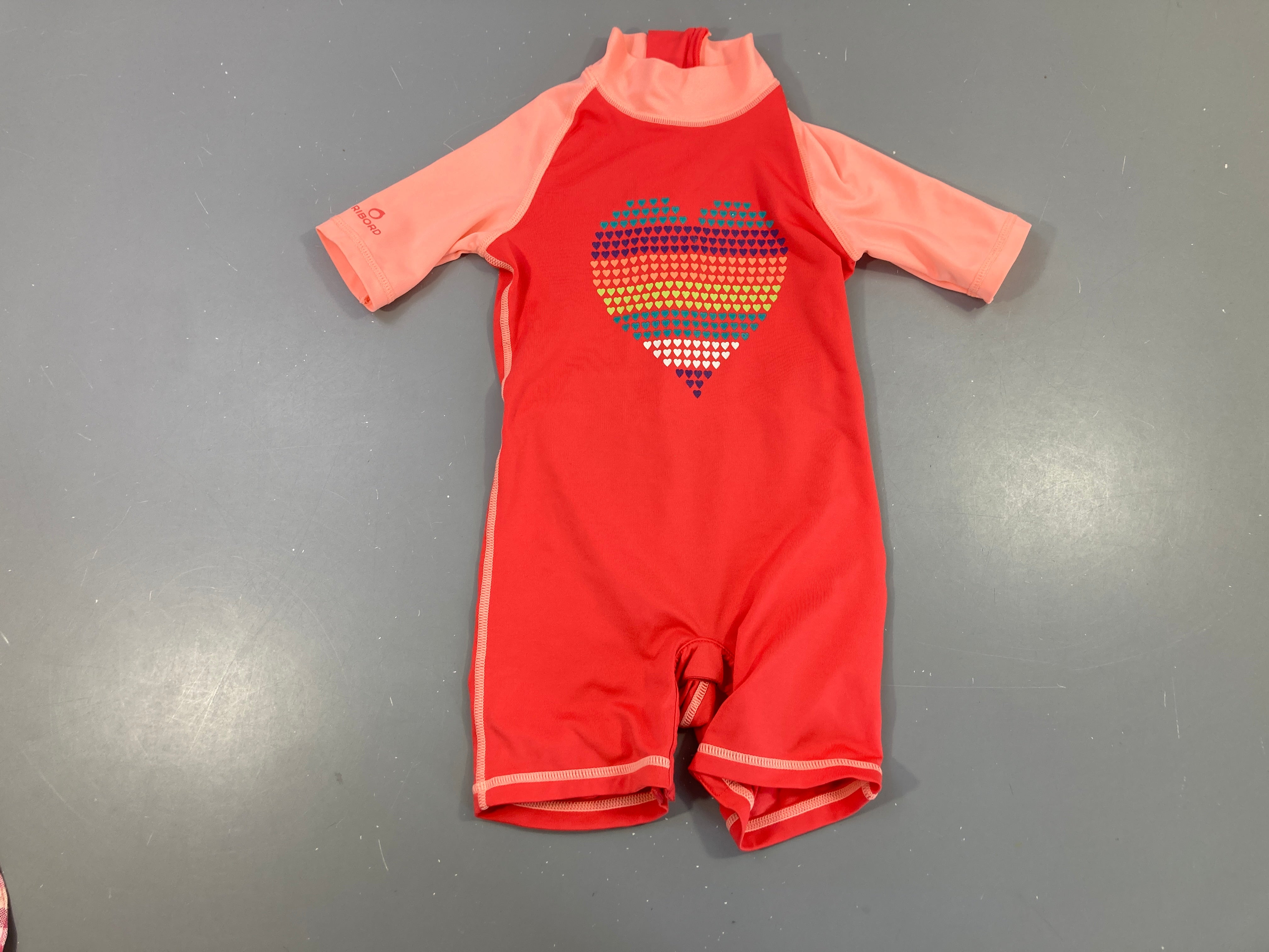 Combi anti-uv rouge/saumon coeur
