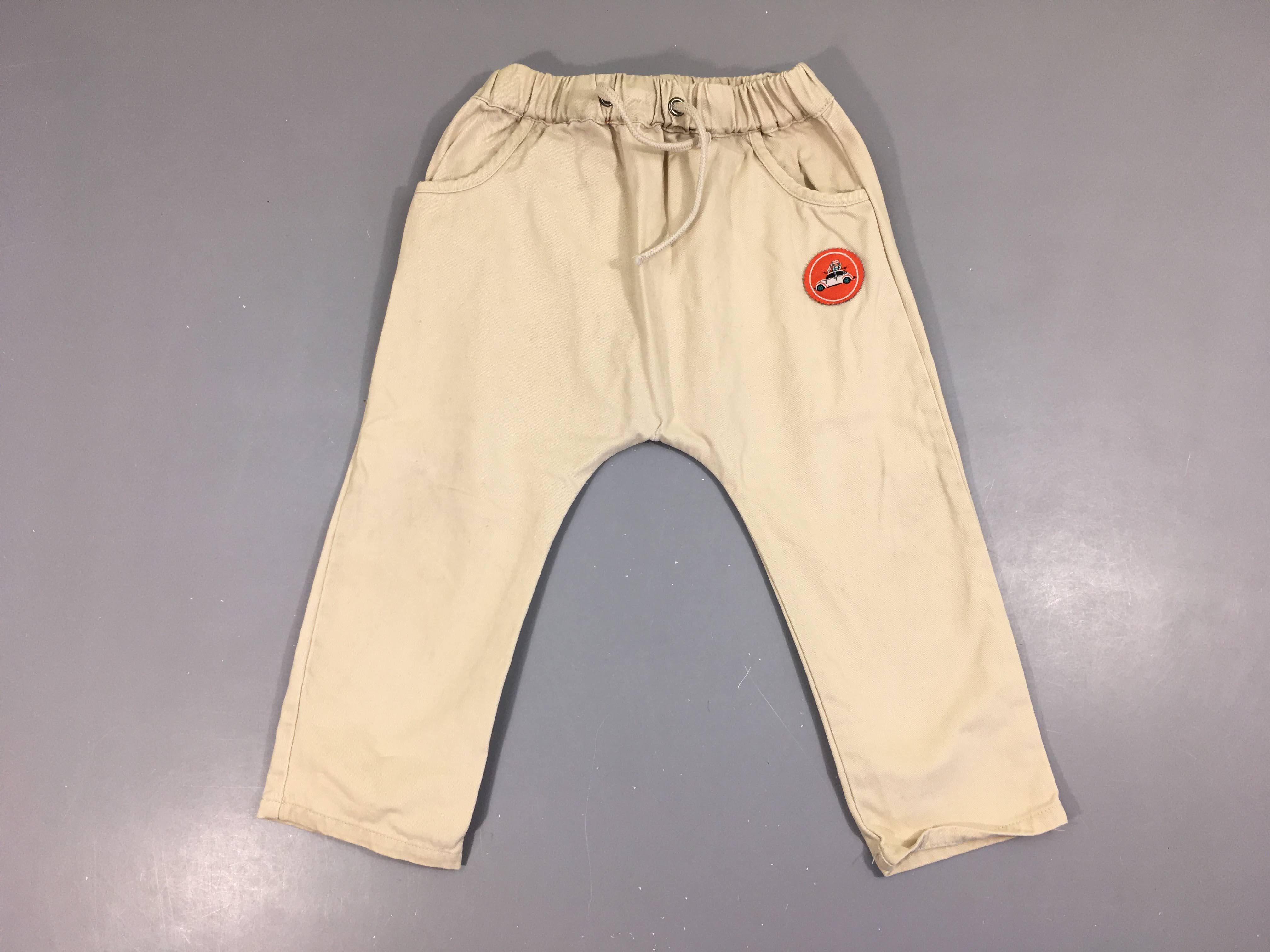 Pantalon beige-Quelques taches