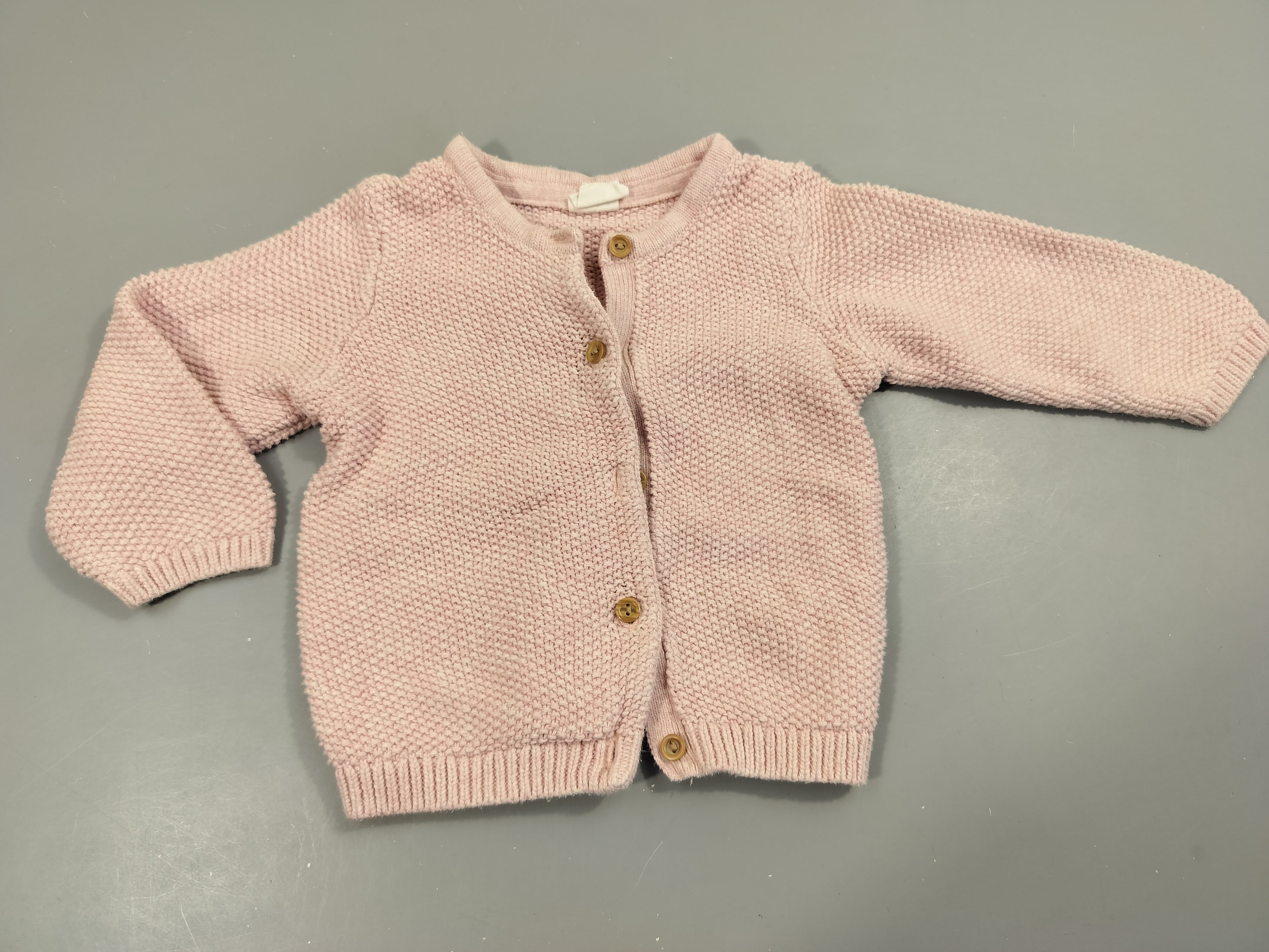 Gilet rose clair texturé