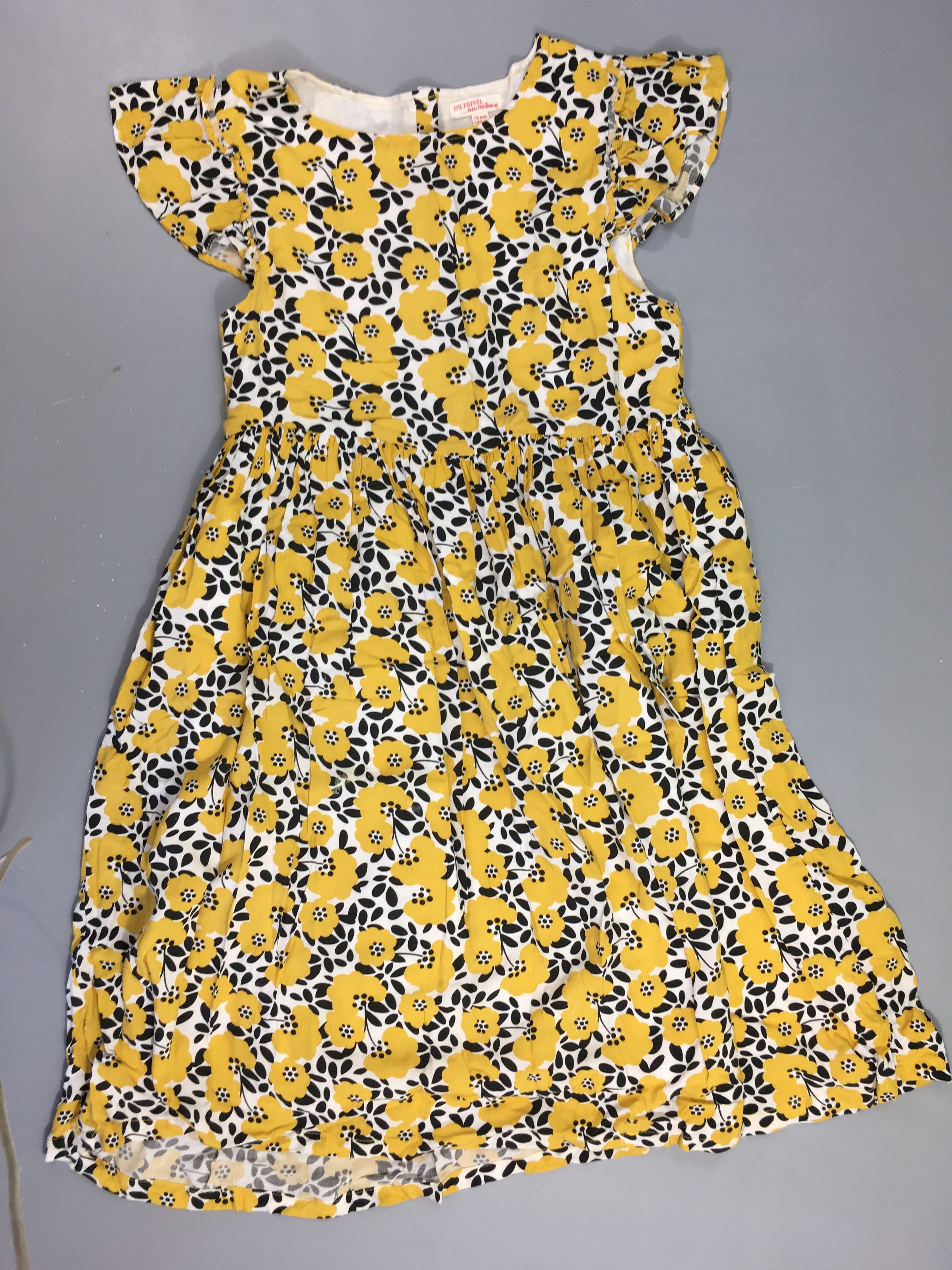 Robe m.c blanche fleurs jaune/noir
