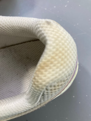 Baskets blanches Artengo-Tache à rafraichir sur contrefort G, moins cher chez Petit Kiwi