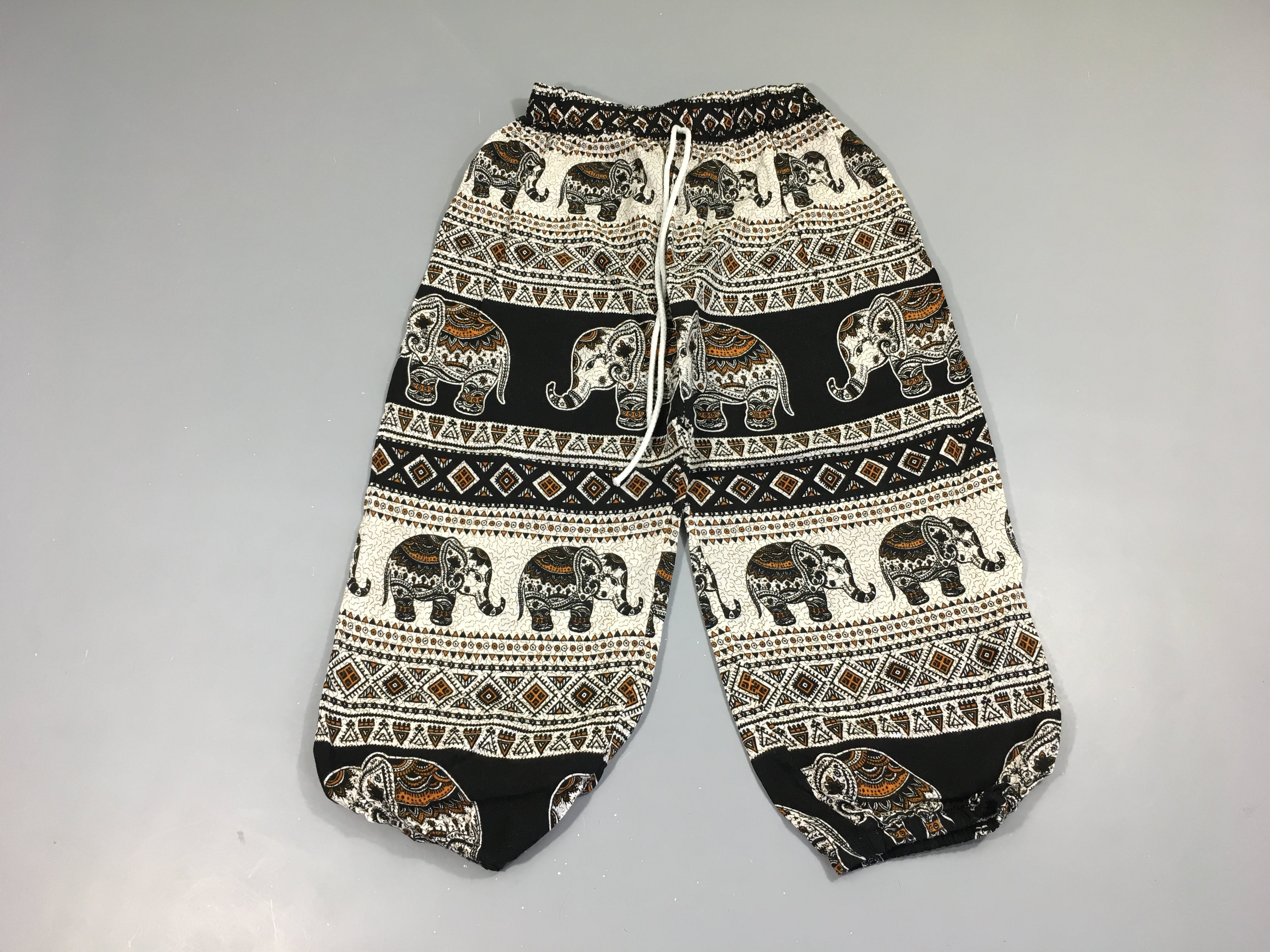 Pantalon taille et chevilles élastiques léger noir/blanc motifs éléphants