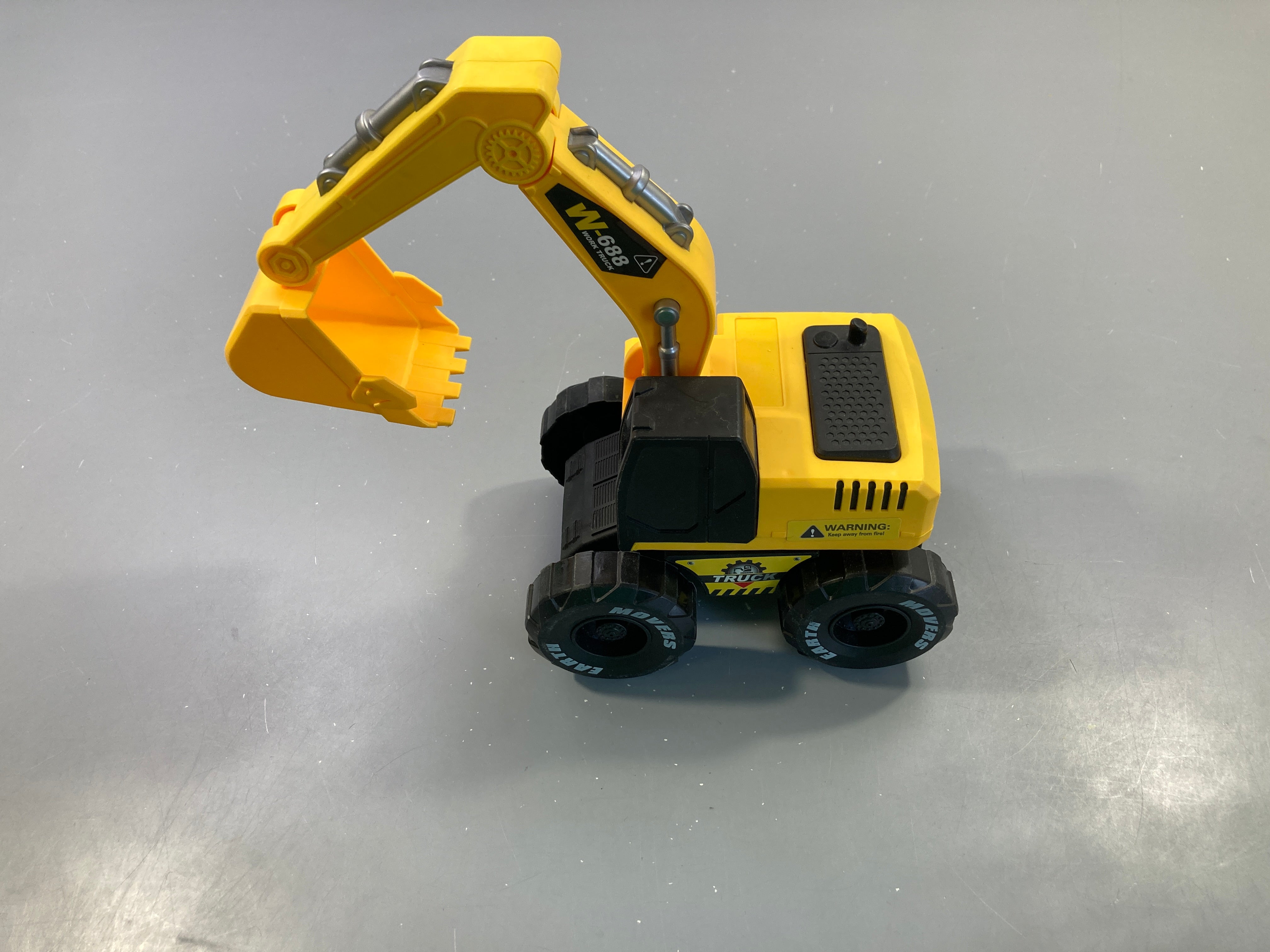 Pelleteuse à friction jaune-noire W-688 avec bras articulé et effet sonores et lumineux +3a