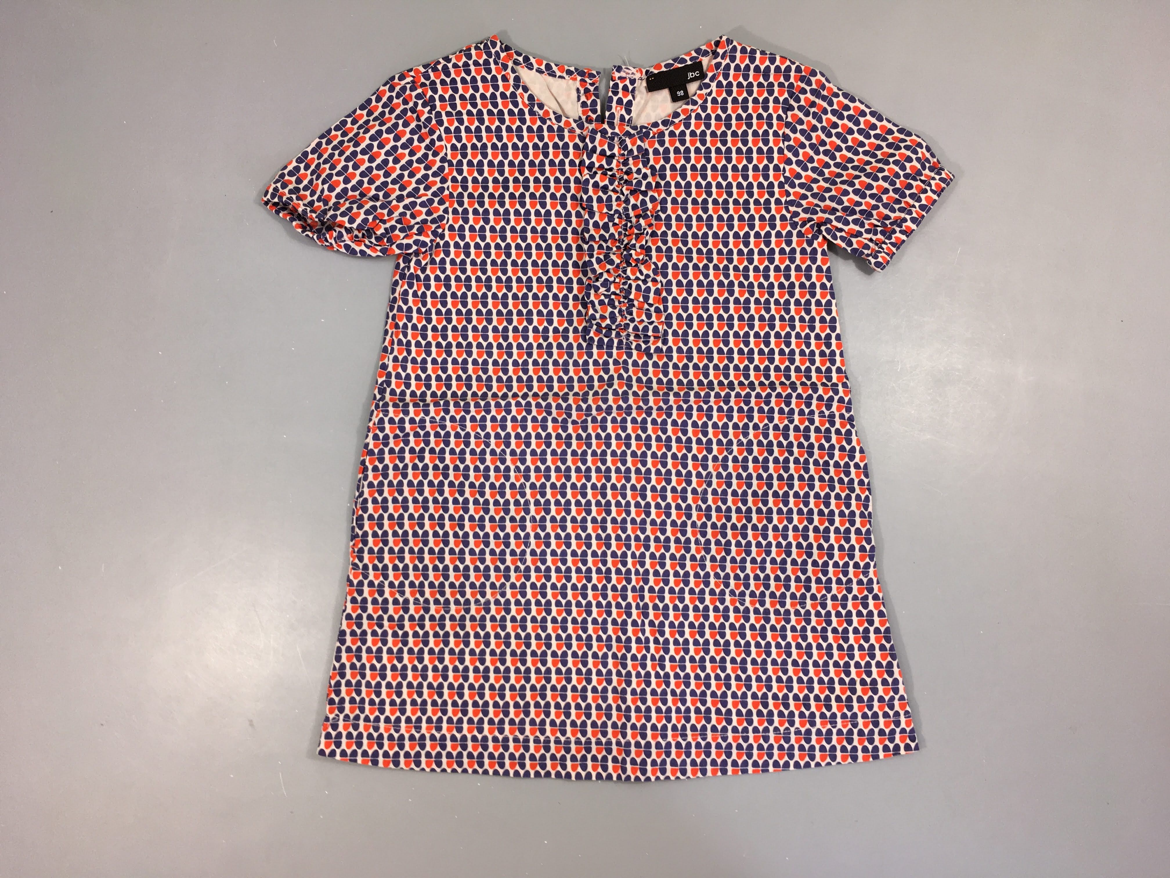 Robe m.c blanche motifs rouges-bleus froufrou buste